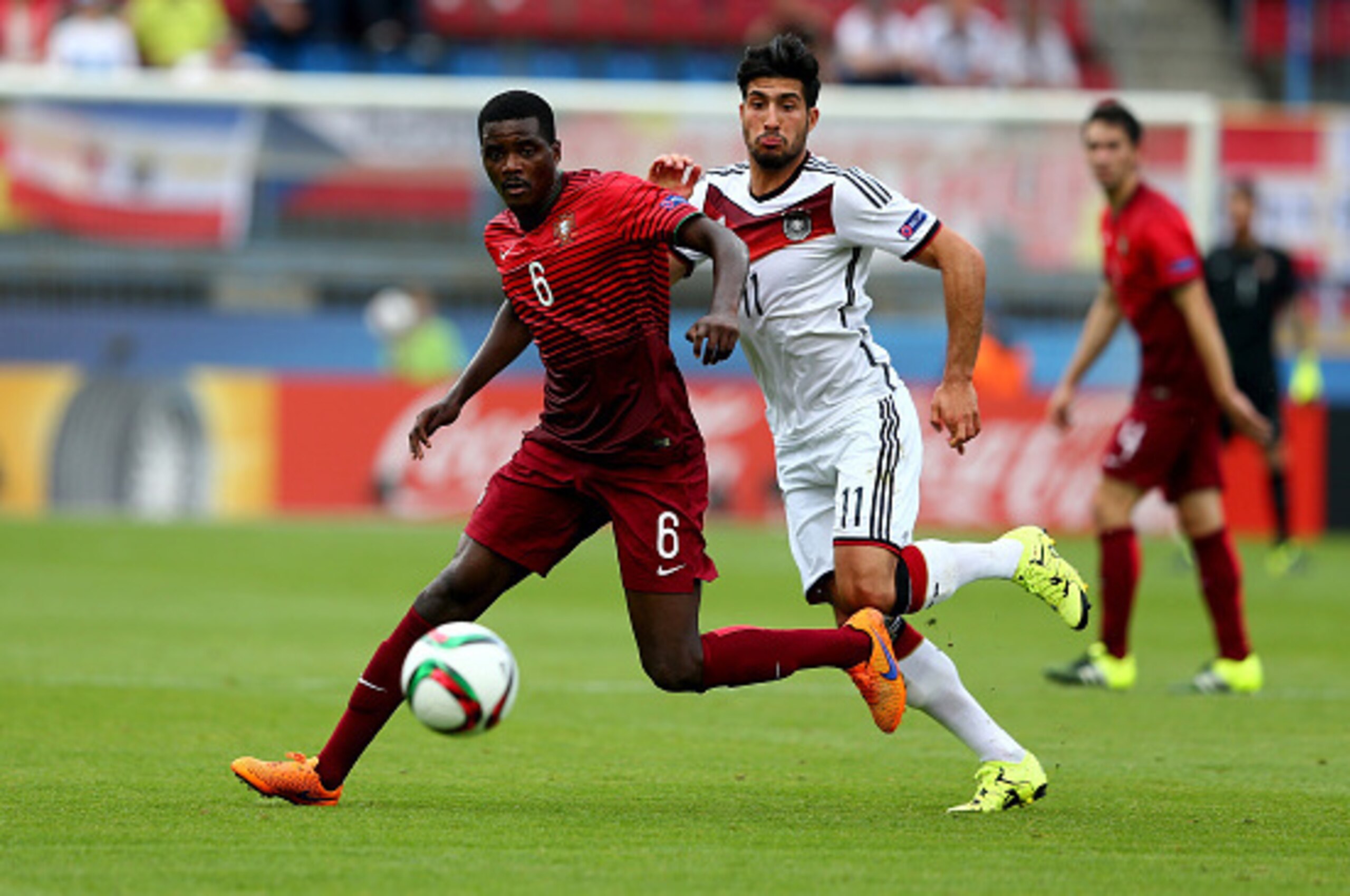 OLOMOUC, CZECH REPUBLIC - JUNE 27: William Carvalho (L) of Portugal and Emre Can of Germany battle for the ball during the UEFA European Under-21 semi final match Between Portugal and Germany at Ander Stadium on June 27, 2015 in Olomouc, Czech Republic.  