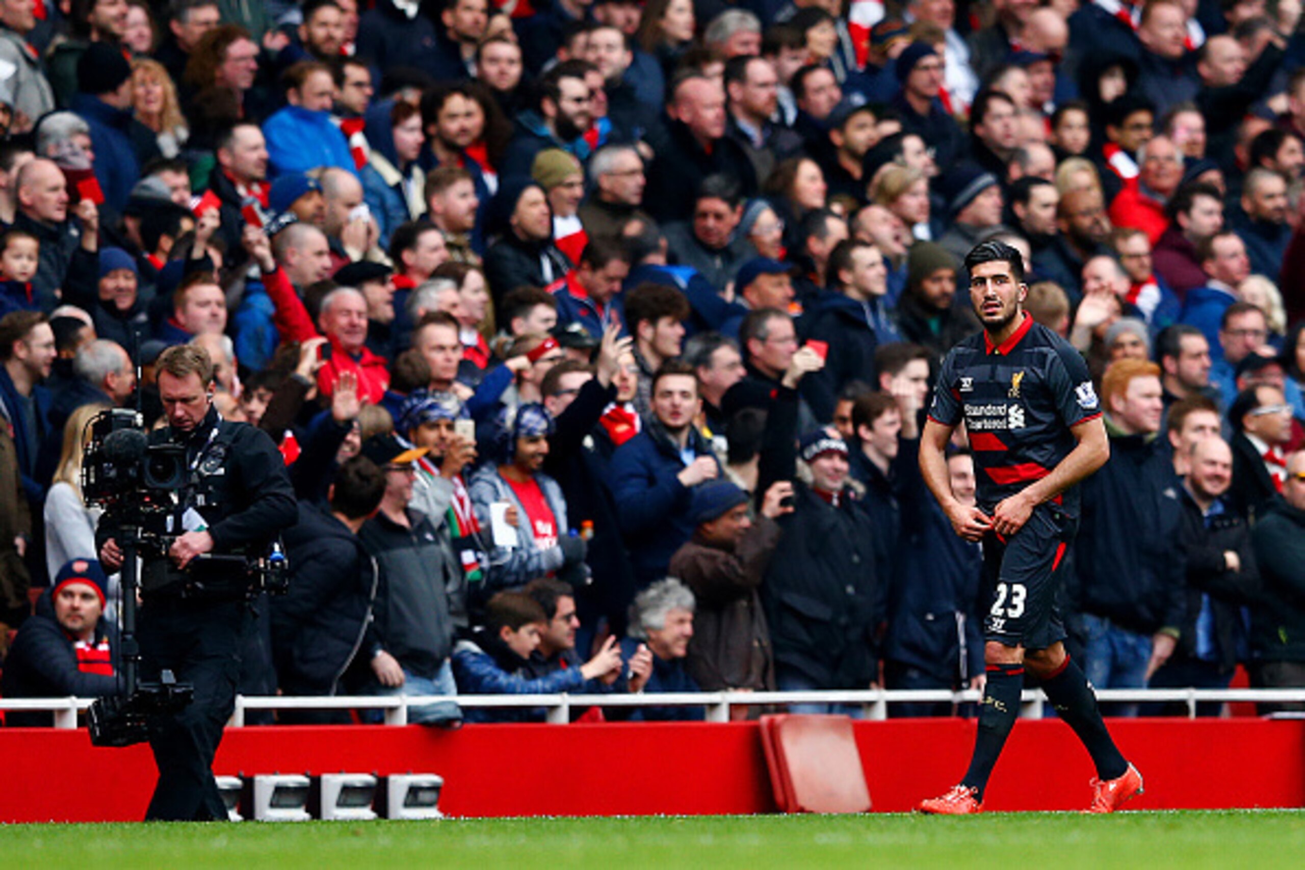 LONDON, ENGLAND - APRIL 04:  Emre Can of Liverpool leaves the field after being sent off during the Barclays Premier League match between Arsenal and Liverpool at Emirates Stadium on April 4, 2015 in London, England.  (Photo by Julian Finney/Getty Images)
