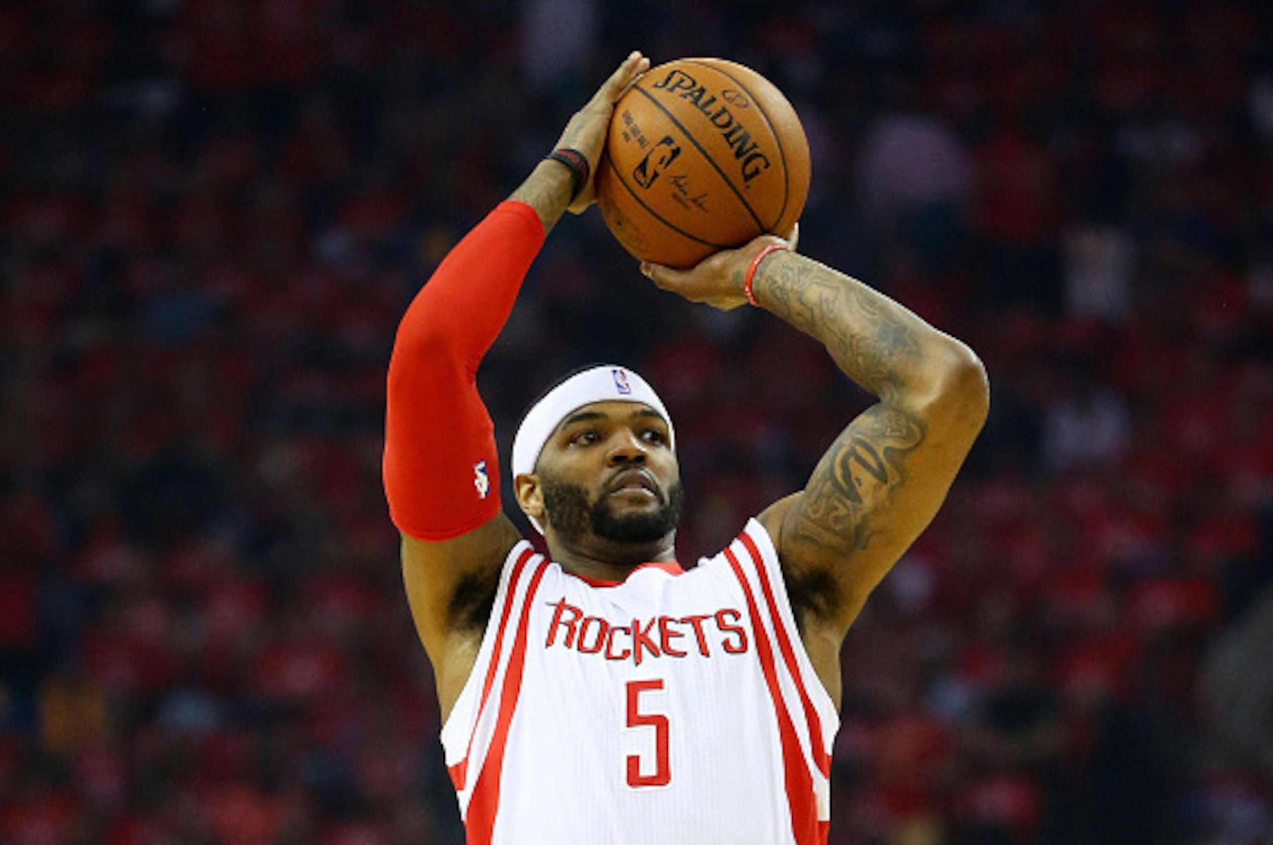 HOUSTON, TX - MAY 25: Josh Smith #5 of the Houston Rockets shoots against the Golden State Warriors in the first quarter during Game Four of the Western Conference Finals of the 2015 NBA PLayoffs at Toyota Center on May 25, 2015 in Houston, Texas. NOTE HOUSTON, TX - MAY 25: Josh Smith #5 of the Houston Rockets shoots against the Golden State Warriors in the first quarter during Game Four of the Western Conference Finals of the 2015 NBA PLayoffs at Toyota Center on May 25, 2015 in Houston, Texas. NOTE