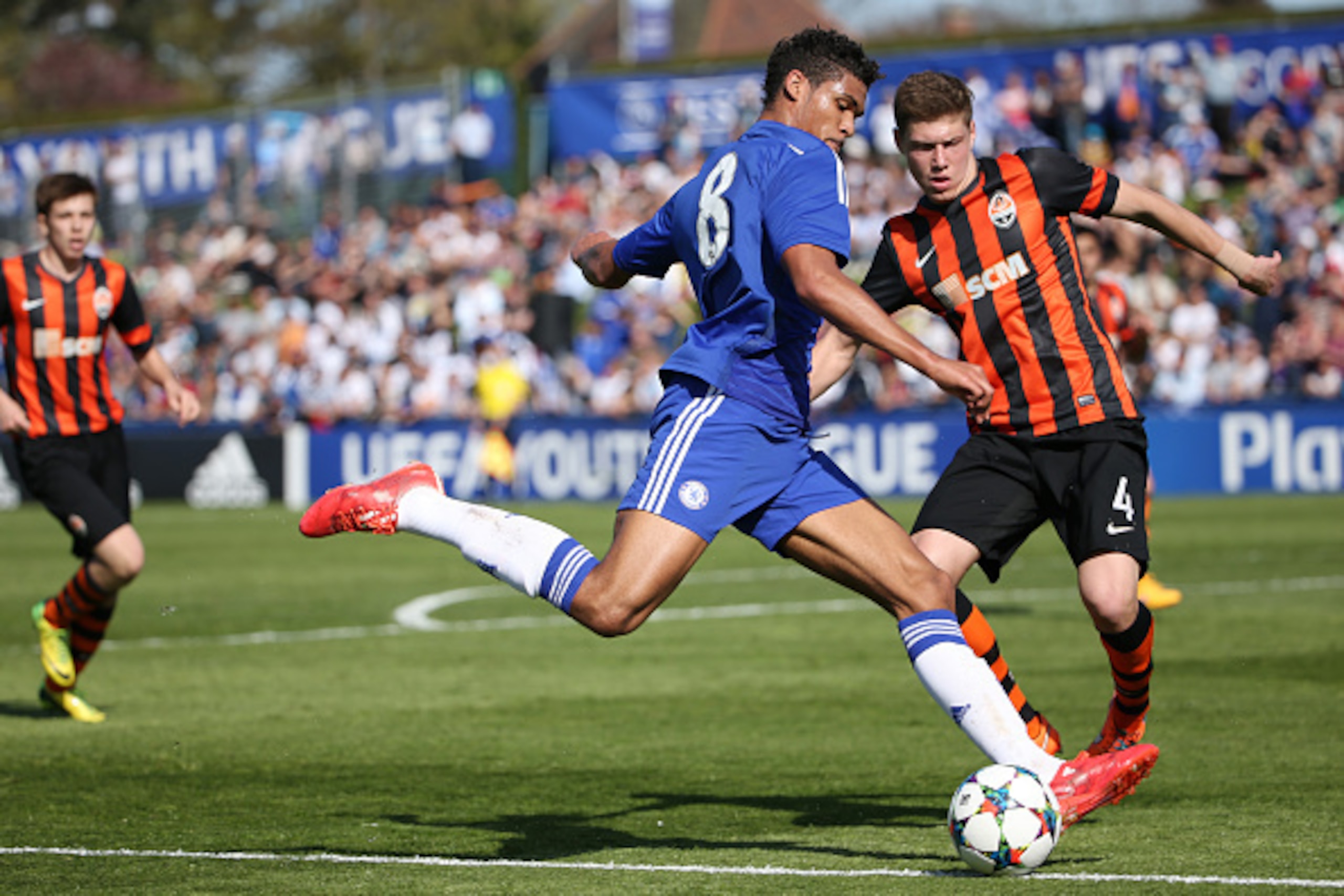 NYON, SWITZERLAND - APRIL 13: Ruben Loftus-Cheek of Chelsea FC (L) shoots the ball under pressure from Mykola Matviyenko of Shakhtar Donetsk (R) during the UEFA Youth League Final match between Shakhtar Donetsk and Chelsea FC at Colovray Stadion on April 