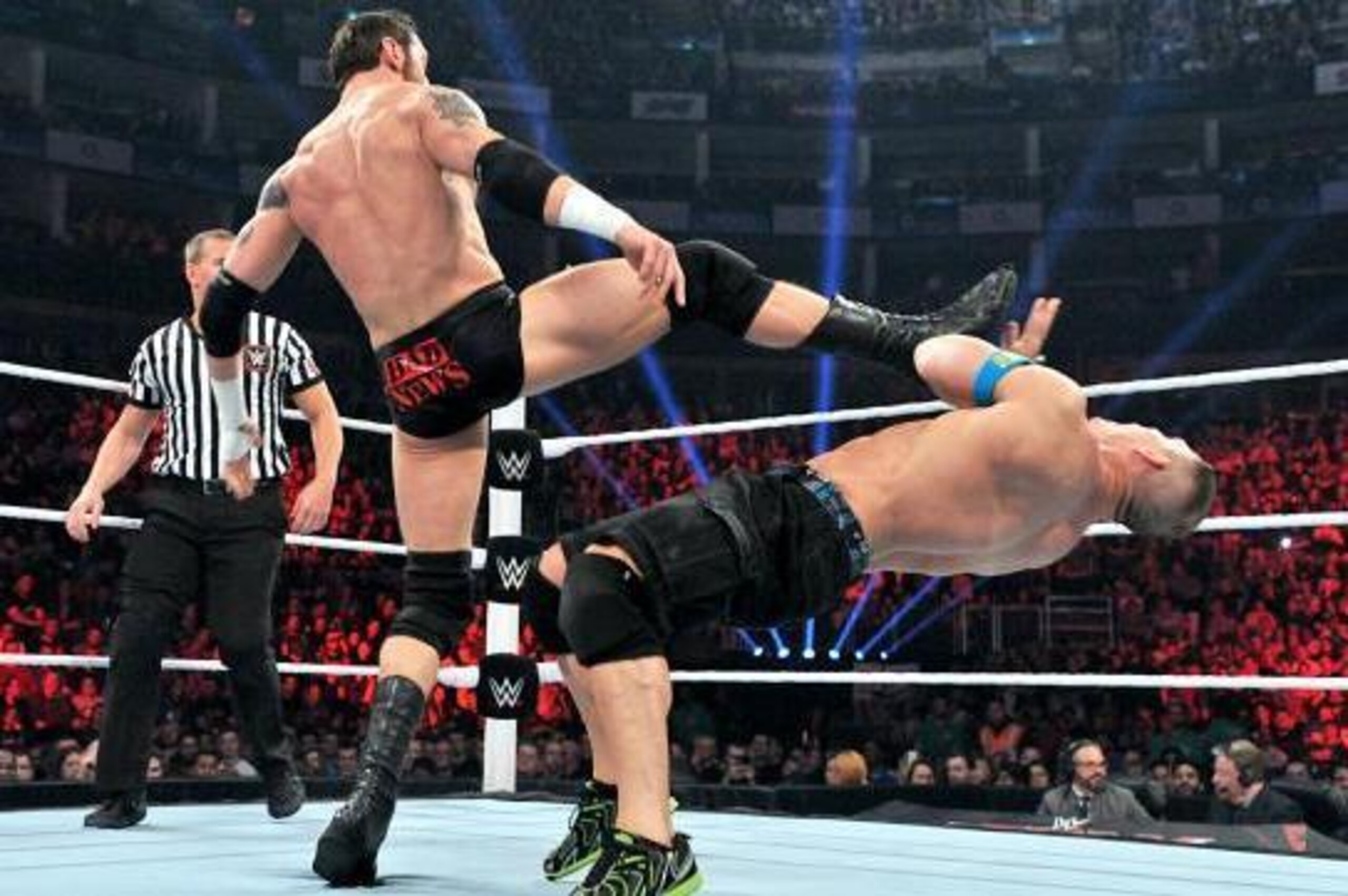 King Barrett nails John Cena with a kick. King Barrett nails John Cena with a kick.