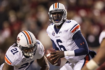 FAYETTEVILLE, AR - NOVEMBER 2: Jeremy Johnson #6 of the Auburn Tigers looks downfield for a receiver during a game against the Arkansas Razorbacks at Razorback Stadium on November 2, 2013 in Fayetteville, Arkansas. The Tigers defeated the Razorbacks 35 FAYETTEVILLE, AR - NOVEMBER 2: Jeremy Johnson #6 of the Auburn Tigers looks downfield for a receiver during a game against the Arkansas Razorbacks at Razorback Stadium on November 2, 2013 in Fayetteville, Arkansas. The Tigers defeated the Razorbacks 35