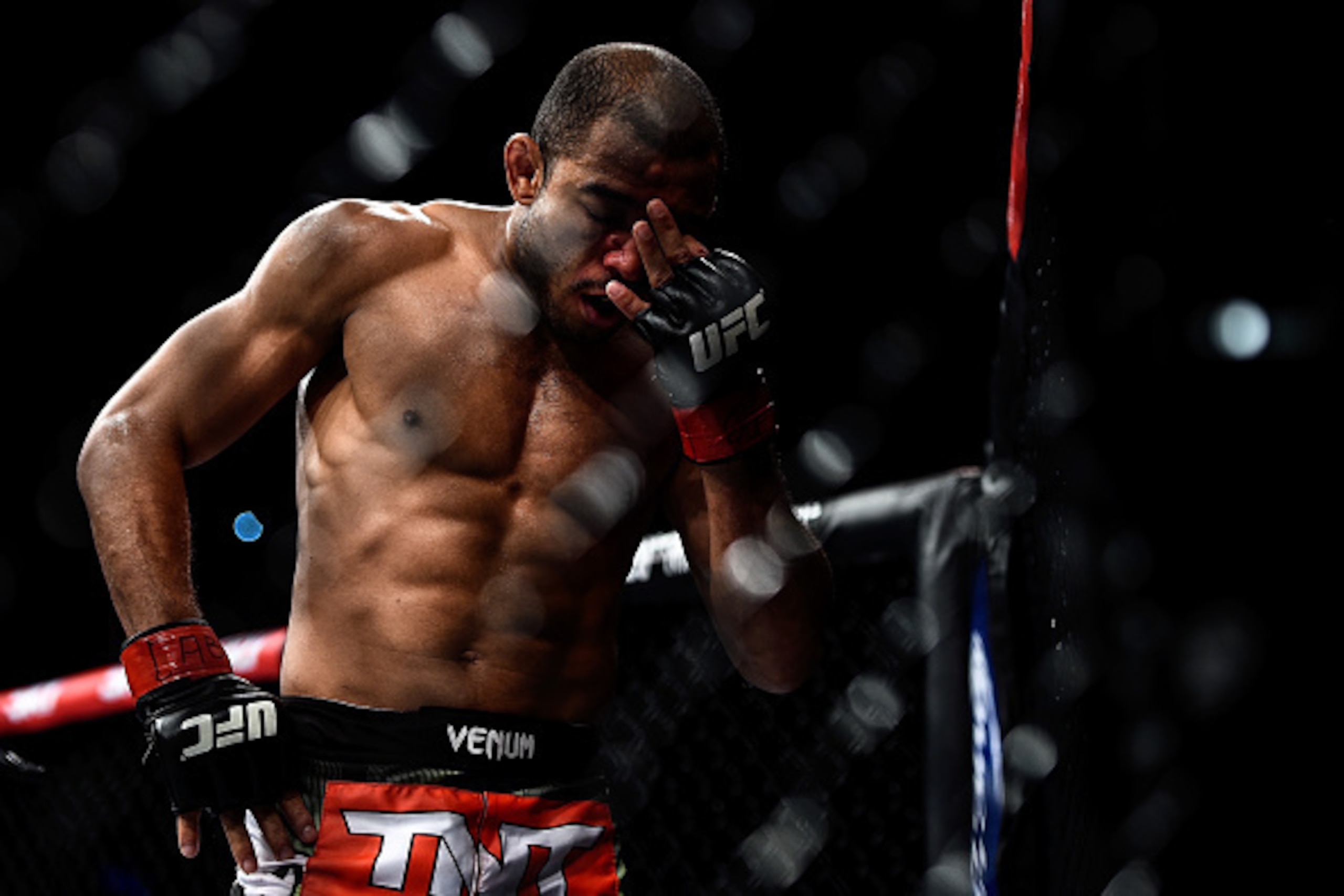 RIO DE JANEIRO, BRAZIL - OCTOBER 25: Jose Aldo of Brazil reacts in his featherweight championship bout against Chad Mendes of the United States during the UFC 179 event at Maracanazinho on October 25, 2014 in Rio de Janeiro, Brazil. (Photo by Buda Mendes/