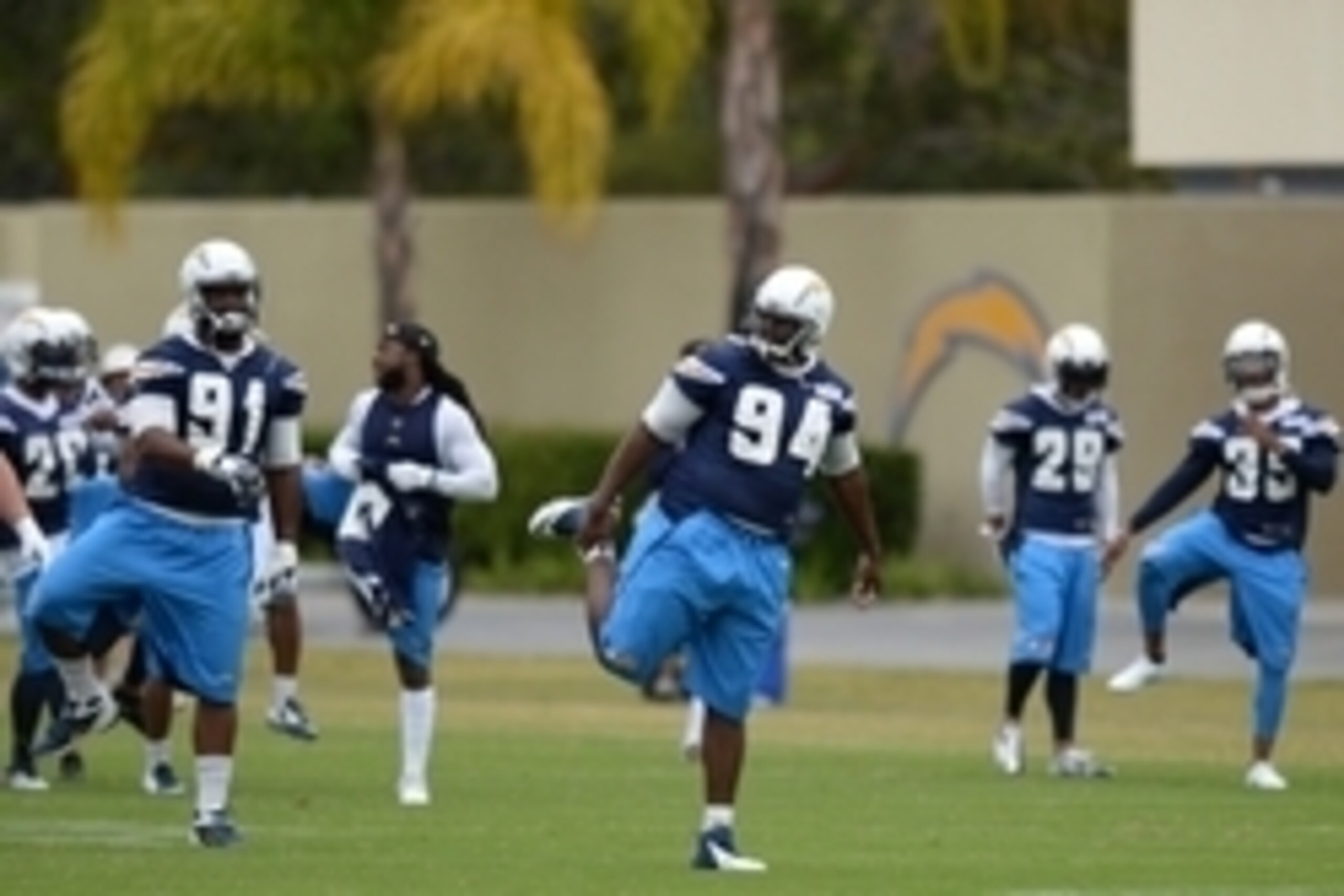 May 26, 2015; San Diego, CA, USA; San Diego Chargers defensive end Kendall Reyes (91) and defensive end Corey Liuget (94) stretch during organized team activities at Charger Park. Mandatory Credit: Jake Roth-USA TODAY Sports
