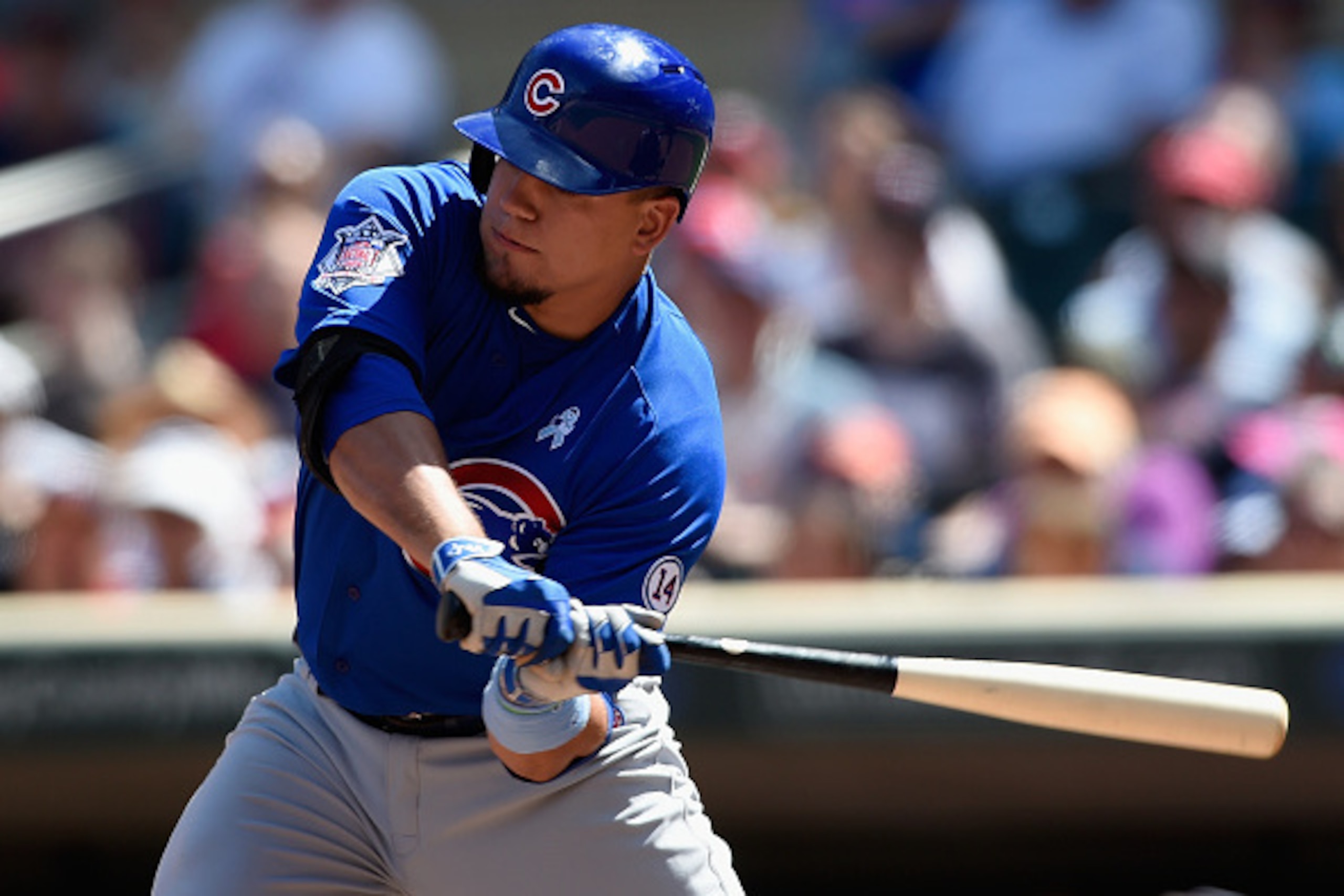 MINNEAPOLIS, MN - JUNE 21: Kyle Schwarber #12 of the Chicago Cubs hits a two-run single against the Minnesota Twins during the eighth inning of the game on June 21, 2015 at Target Field in Minneapolis, Minnesota. The Cubs defeated the Twins 8-0. (Photo by