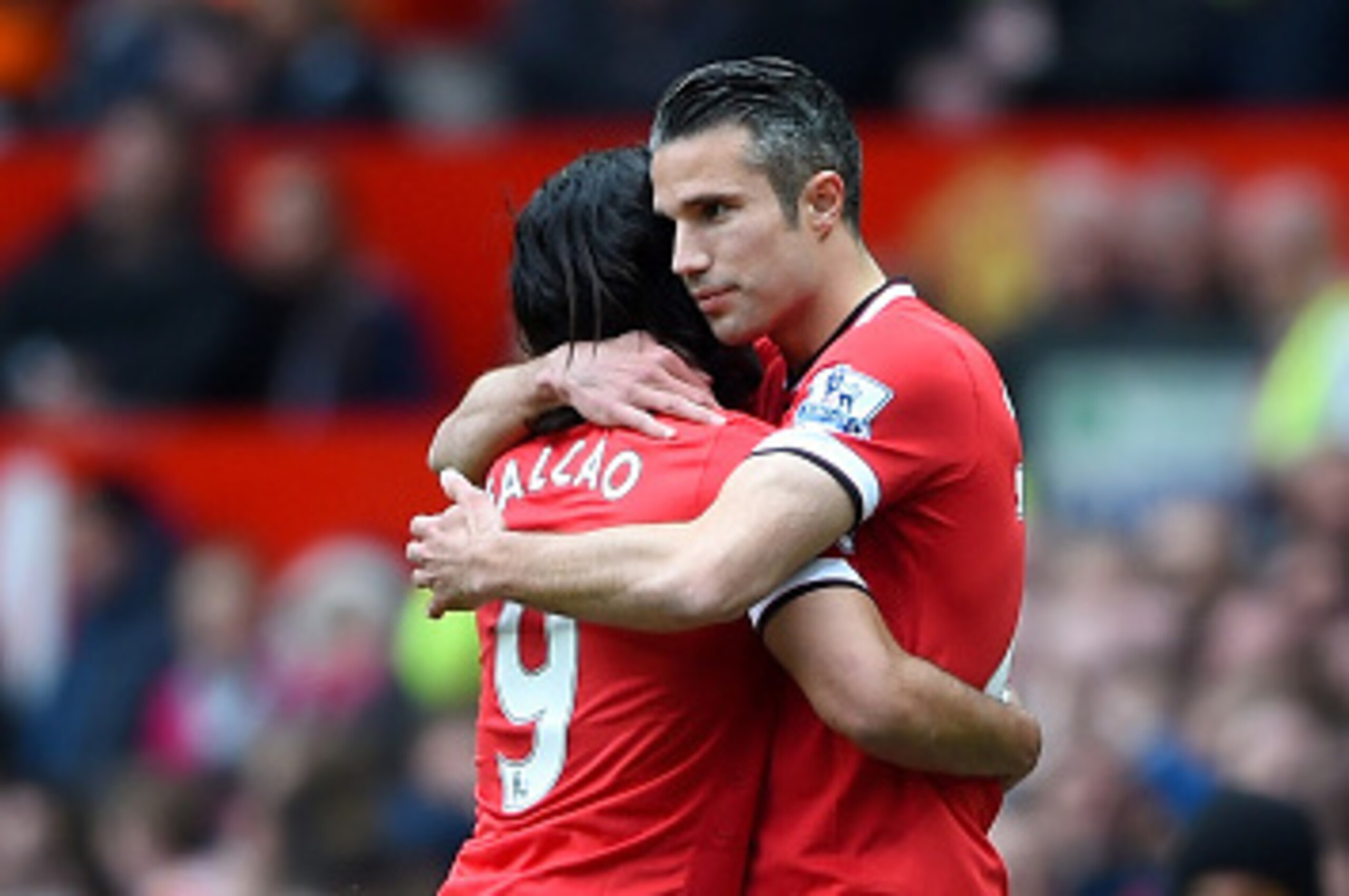 MANCHESTER, ENGLAND - MAY 17: Radamel Falcao Garcia of Manchester United is embraced by Robin van Persie of Manchester United as he is substituted during the Barclays Premier League match between Manchester United and Arsenal at Old Trafford on May 17, 2 MANCHESTER, ENGLAND - MAY 17: Radamel Falcao Garcia of Manchester United is embraced by Robin van Persie of Manchester United as he is substituted during the Barclays Premier League match between Manchester United and Arsenal at Old Trafford on May 17, 2