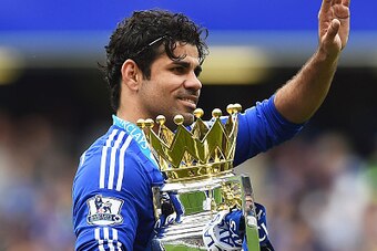LONDON, ENGLAND - MAY 24:  Diego Costa of Chelsea holding the trophy waves to supporters after the Barclays Premier League match between Chelsea and Sunderland at Stamford Bridge on May 24, 2015 in London, England.  (Photo by Laurence Griffiths/Getty Imag