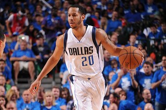 DALLAS, TX - APRIL 26:  Devin Harris #20 of the Dallas Mavericks brings the ball up court against the Houston Rockets in Game Four of the Western Conference Quarterfinals during the 2015 NBA Playoffs on April 26, 2015 at the American Airlines Center in Da
