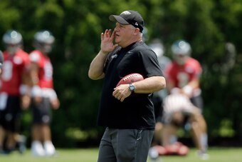 Chip Kelly hollers instructions during an Eagles practice in June.