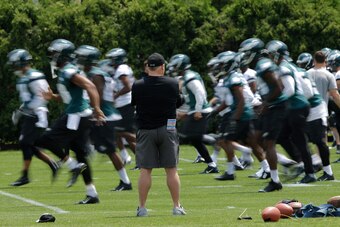 Chip Kelly oversees a drill at an Eagles practice in June.