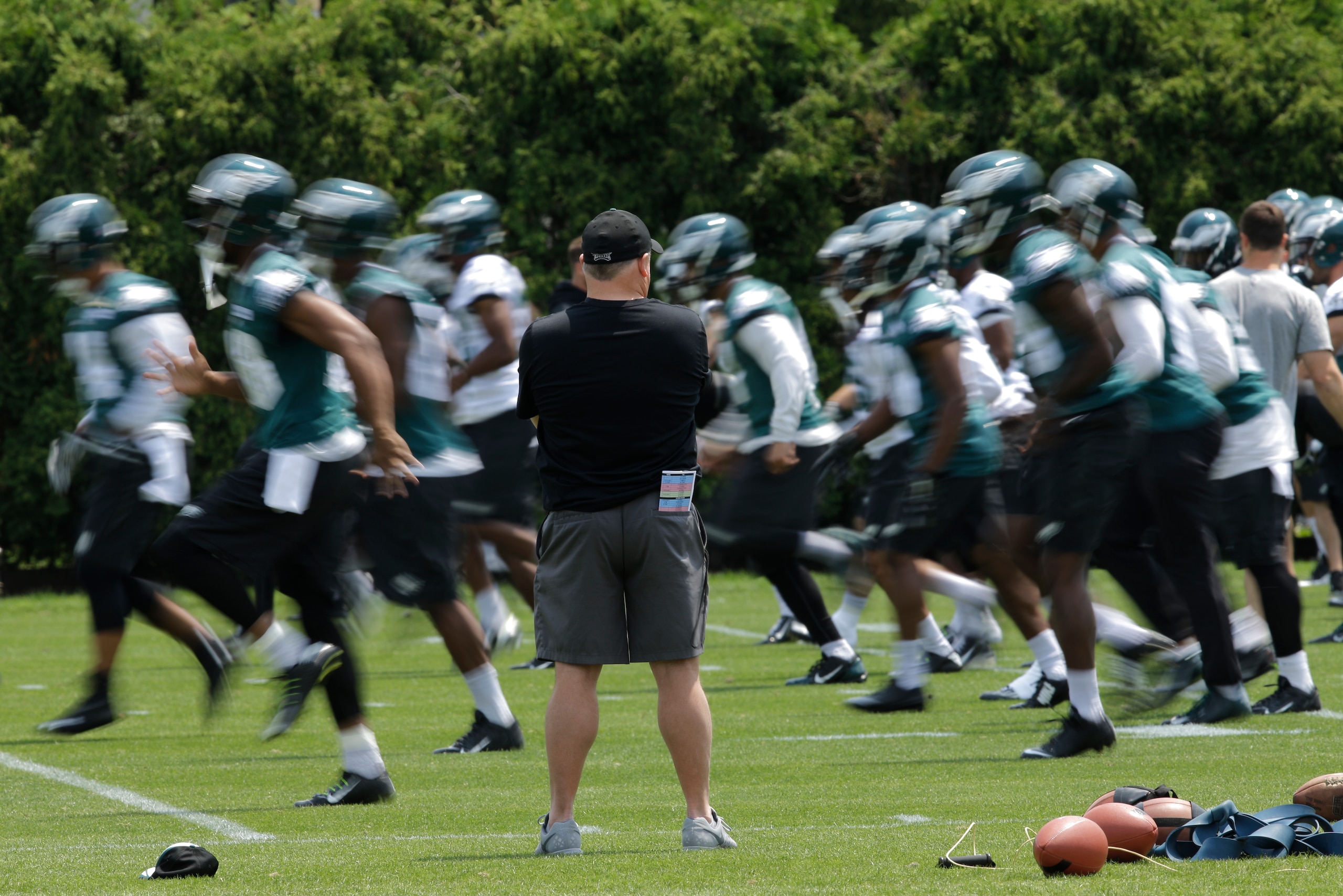 Chip Kelly oversees a drill at an Eagles practice in June.