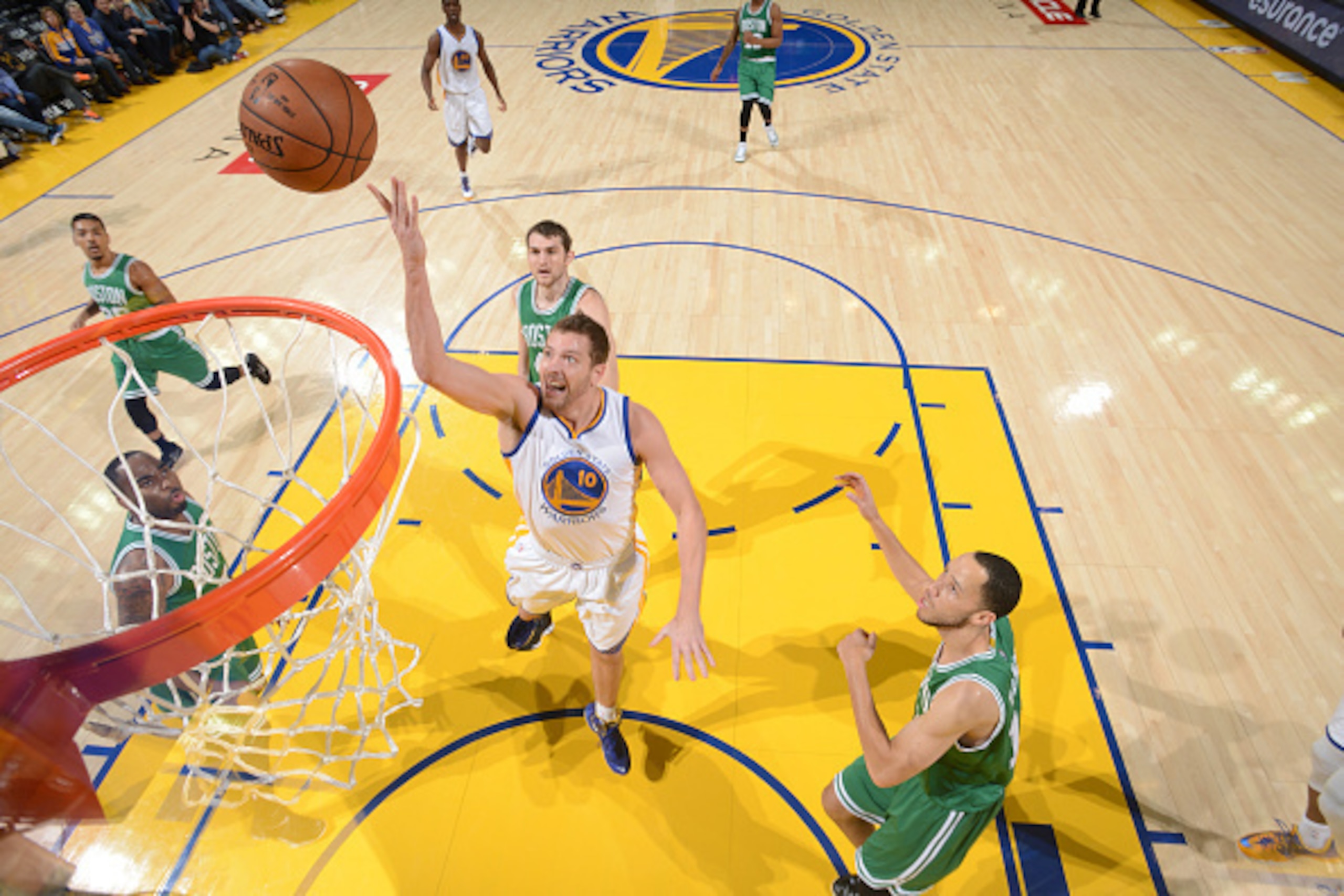 OAKLAND, CA - JANUARY 25: David Lee #10 of the Golden State Warriors shoots against the Boston Celtics on January 25, 2015 at Oracle Arena in Oakland, California. NOTE TO USER: User expressly acknowledges and agrees that, by downloading and or using this OAKLAND, CA - JANUARY 25: David Lee #10 of the Golden State Warriors shoots against the Boston Celtics on January 25, 2015 at Oracle Arena in Oakland, California. NOTE TO USER: User expressly acknowledges and agrees that, by downloading and or using this
