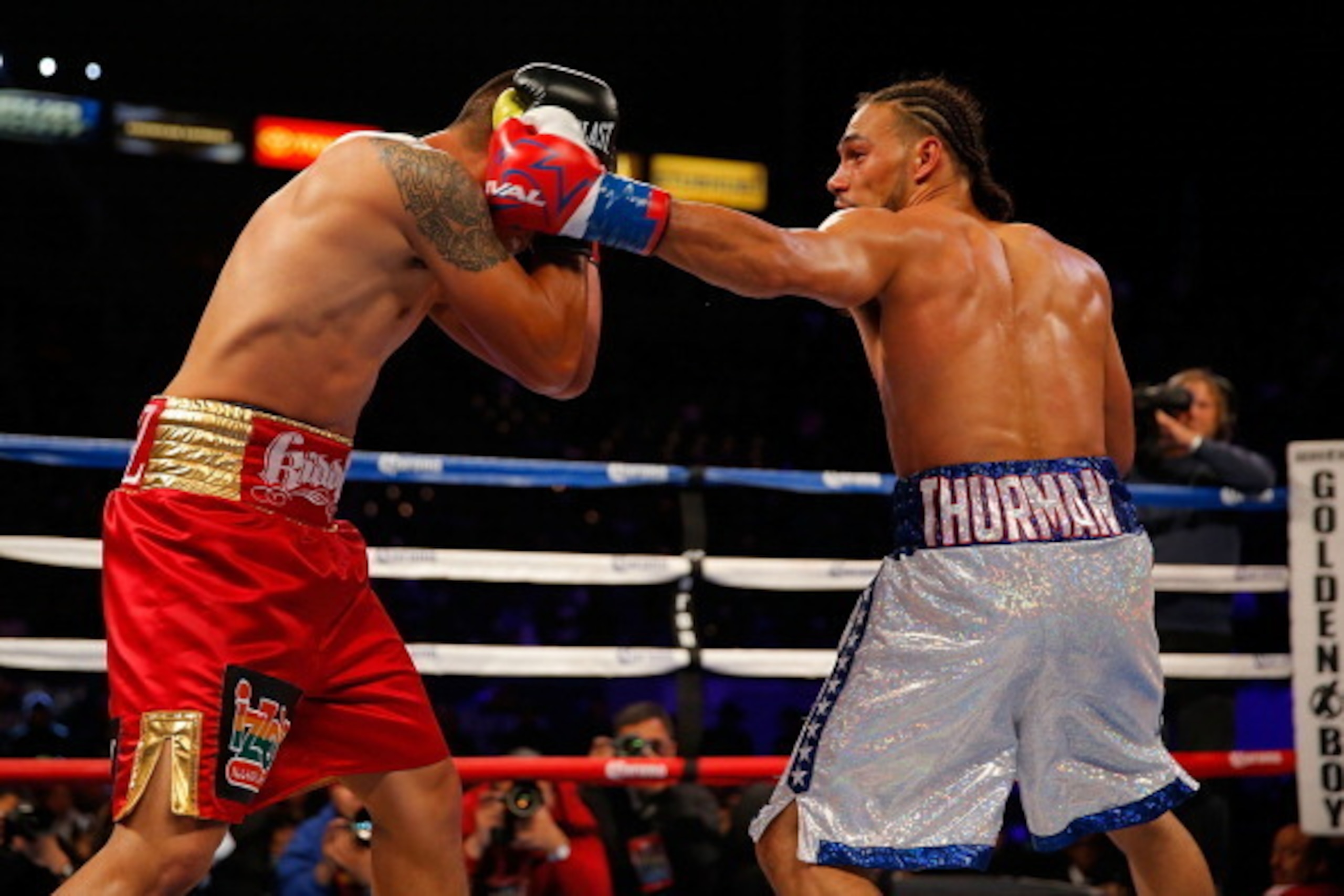 LOS ANGELES, CA - APRIL 26:  Keith Thurman punches Julio Diaz during their fight for the interim WBA Welterweight Championship at StubHub Center on April 26, 2014 in Los Angeles, California.  (Photo by Joe Scarnici/Getty Images)