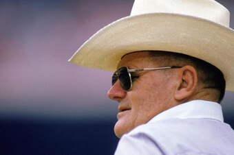 1984:  Head coach Bum Phillips of the New Orleans Saints stands on the sideline during a 1984 NFL game against the Los Angeles Rams.  (Photo by Rick Stewart/Getty Images)