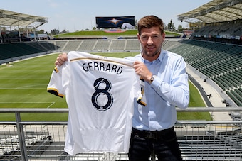 CARSON, CA - JULY 7: New Los Angeles Galaxy midfielder Steven Gerrard #8 poses with his jersey after a news conference on July 7, 2015 at StubHub Center in Carson, California. The former Liverpool captain Steven Gerrard is scheduled to play his first MLS 