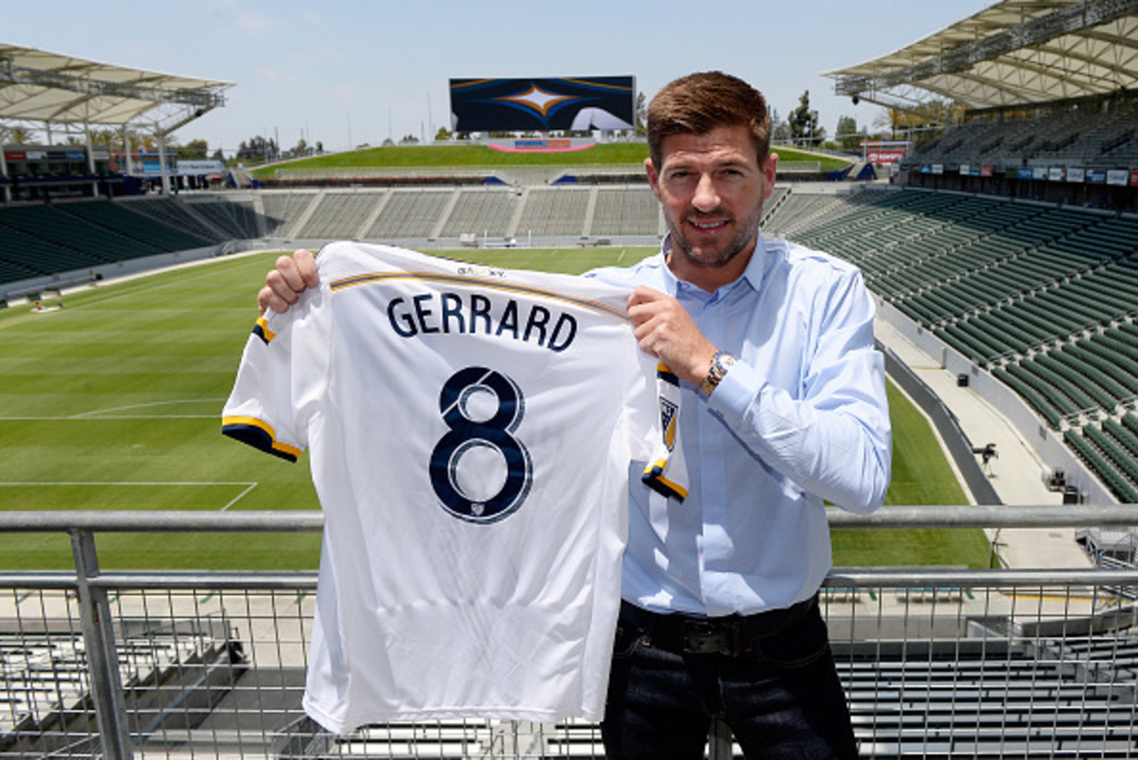 CARSON, CA - JULY 7: New Los Angeles Galaxy midfielder Steven Gerrard #8 poses with his jersey after a news conference on July 7, 2015 at StubHub Center in Carson, California. The former Liverpool captain Steven Gerrard is scheduled to play his first MLS 
