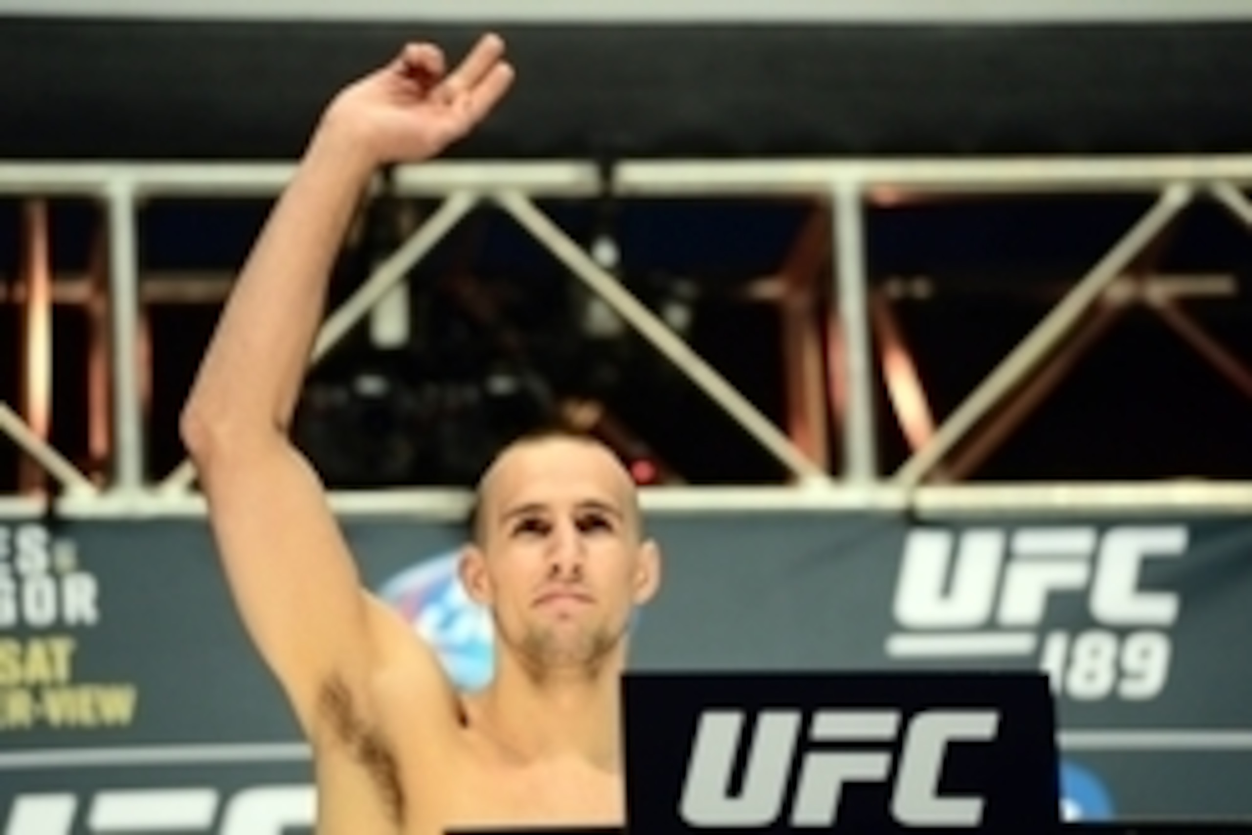 Jul 10, 2015; Las Vegas, NV, USA; Rory MacDonald steps on the scale for his bout against Robbie Lawler (not pictured) during weigh-ins for UFC 189 at MGM Grand Garden Arena. Mandatory Credit: Joe Camporeale-USA TODAY Sports