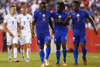 FOXBORO, MA - JULY 10:  Aron Johannsson #9 of United States talks with Clint Dempsey #8 during half time of the 2015 CONCACAF  Gold Cup Group A match between United States and Haiti at Gillette Stadium on July 10, 2015 in Foxboro, Massachusetts.  (Photo b