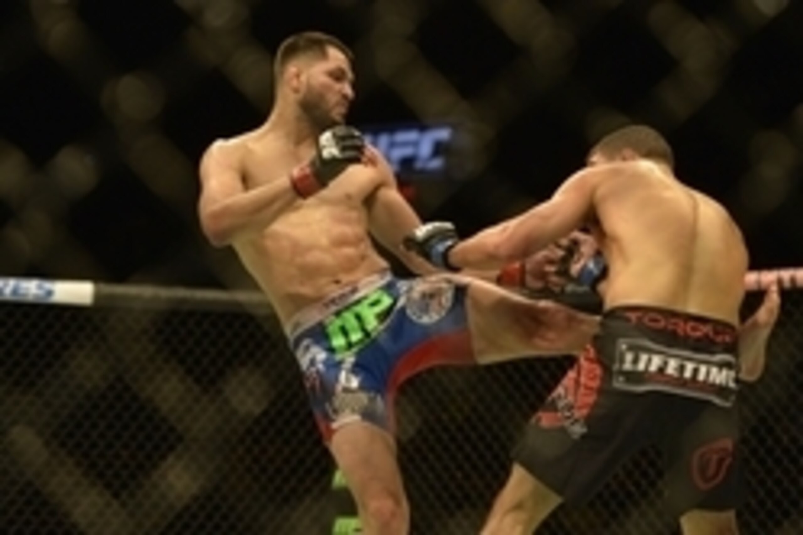 Apr 4, 2015; Fairfax, VA, USA; Jorge Masvidal (red gloves) fights Al Iaquinta (blue gloves) during UFC Fight Night at Patriot Center. Mandatory Credit: Tommy Gilligan-USA TODAY Sports
