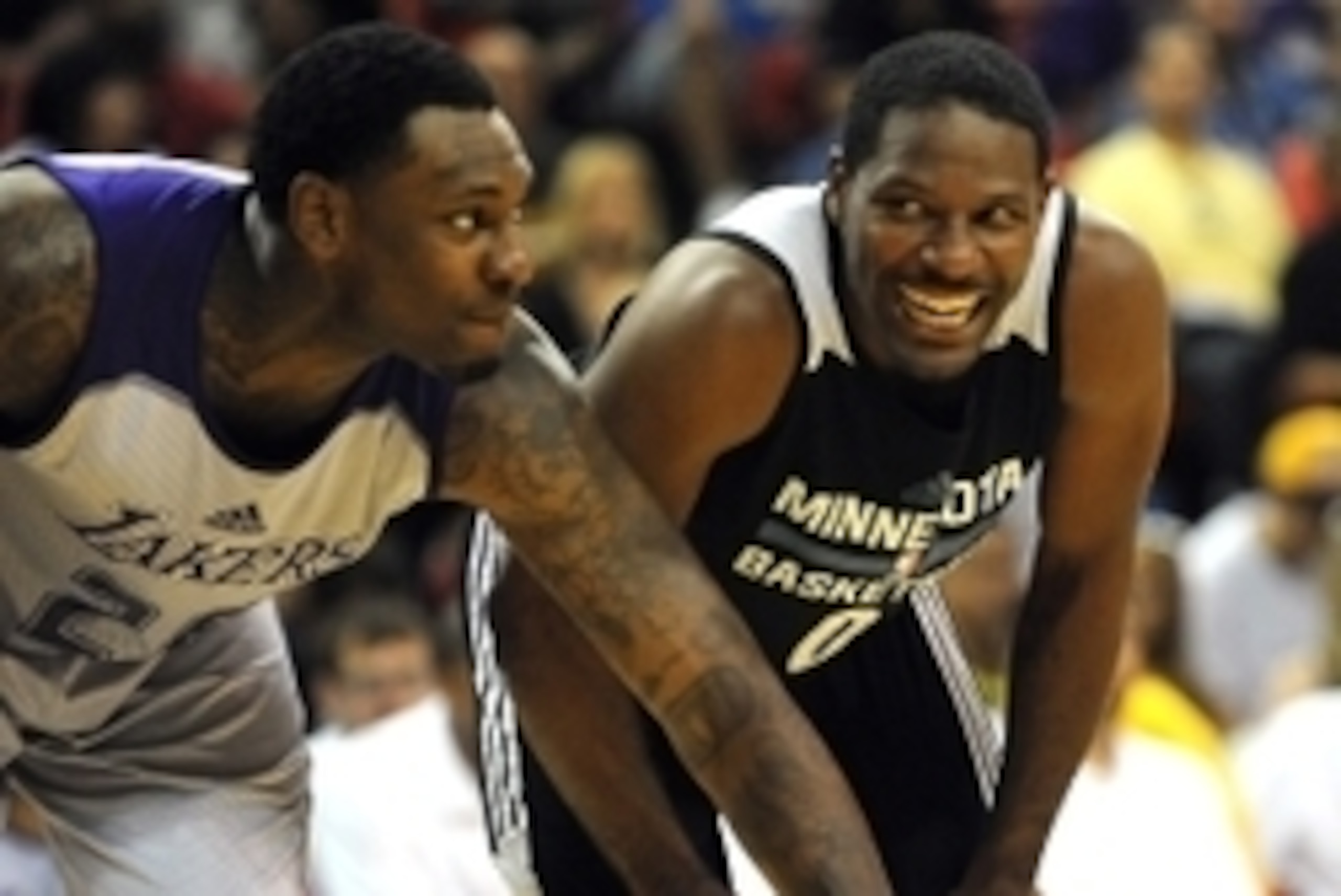 Jul 10, 2015; Las Vegas, NV, USA; Minnesota Timberwolves guard Othyus Jeffers (0) shares a laugh with Los Angeles Lakers center Tarik Black (28) during an NBA Summer League game at Thomas & Mack Center. Minnesota won the game 81-68. Mandatory Credit: Step Jul 10, 2015; Las Vegas, NV, USA; Minnesota Timberwolves guard Othyus Jeffers (0) shares a laugh with Los Angeles Lakers center Tarik Black (28) during an NBA Summer League game at Thomas & Mack Center. Minnesota won the game 81-68. Mandatory Credit: Step