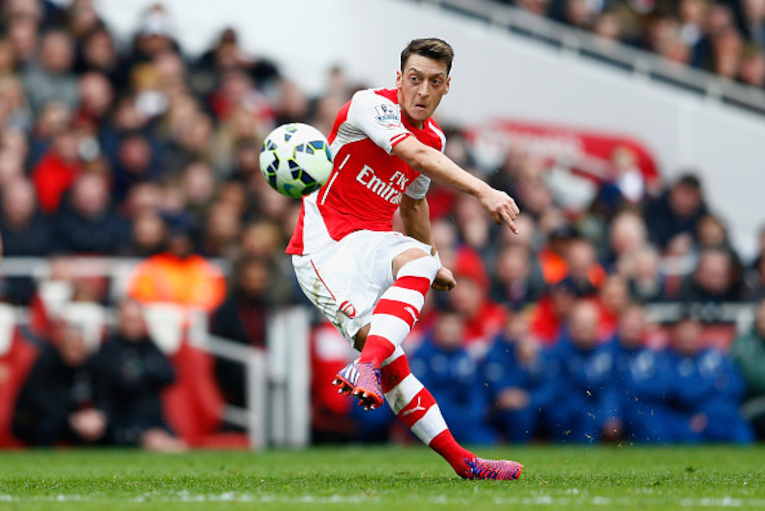 LONDON, ENGLAND - APRIL 04:  Mesut Oezil of Arsenal scores his team's second goal from a free-kick during the Barclays Premier League match between Arsenal and Liverpool at Emirates Stadium on April 4, 2015 in London, England.  (Photo by Julian Finney/Get