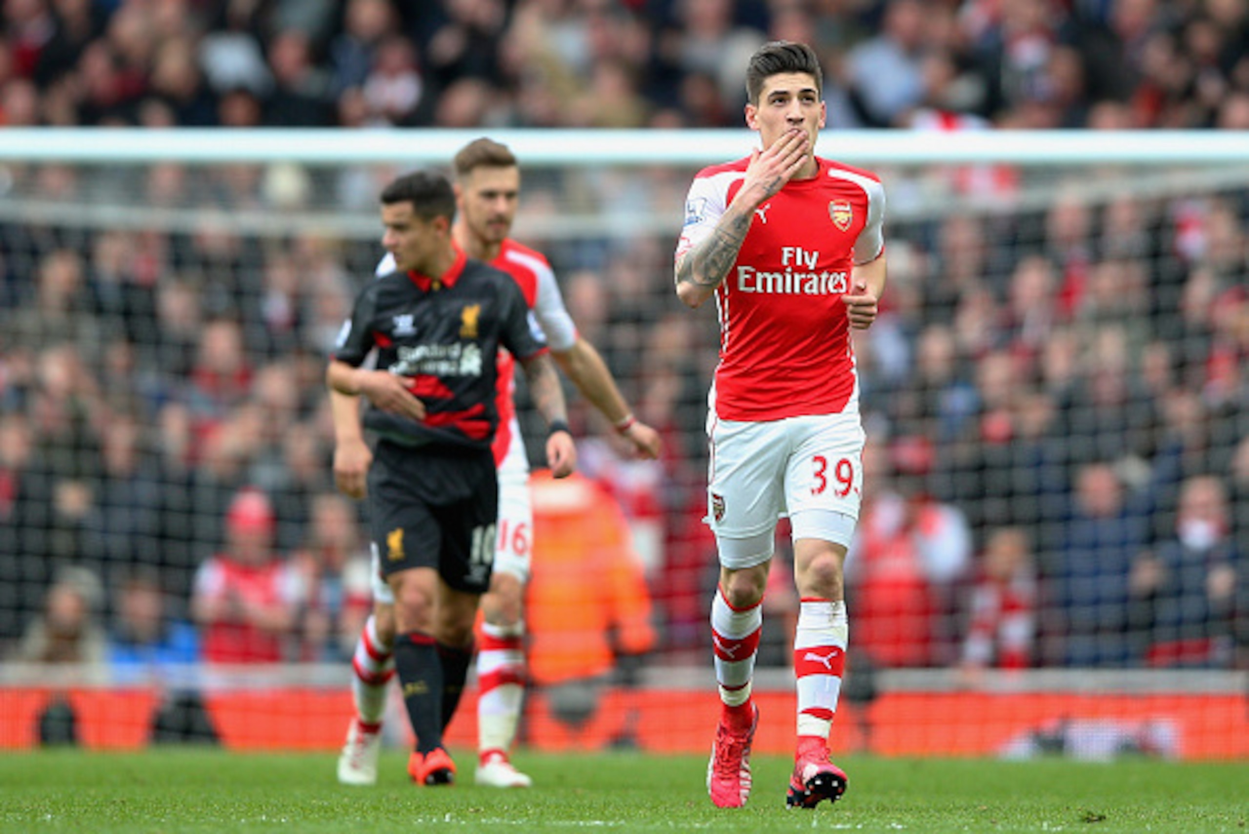 LONDON, ENGLAND - APRIL 04:  Hector Bellerin of Arsenal celebrates after scoring the opening goal during the Barclays Premier League match between Arsenal and Liverpool at Emirates Stadium on April 4, 2015 in London, England.  (Photo by Paul Gilham/Getty 