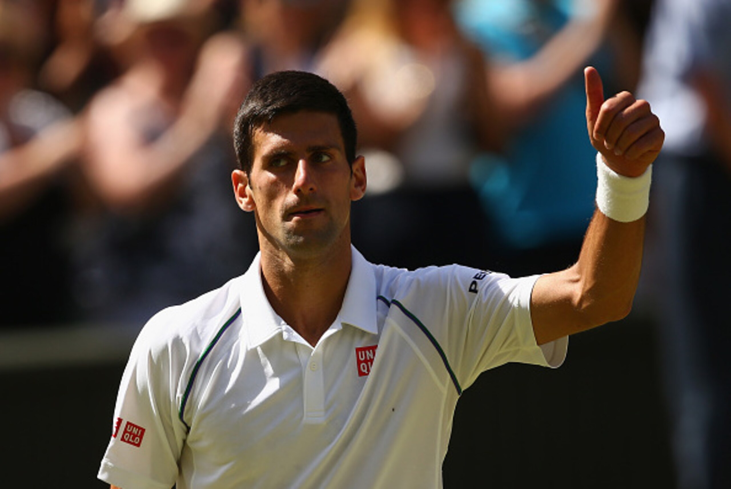 LONDON, ENGLAND - JULY 10:  Novak Djokovic of Serbia celebrates after winning the Gentlemens Singles Semi Final match against Richard Gasquet of France during day eleven of the Wimbledon Lawn Tennis Championships at the All England Lawn Tennis and Croquet