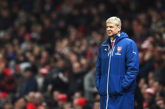 LONDON, ENGLAND - DECEMBER 13:  Arsene Wenger, manager of Arsenal smiles after the second goal of Olivier Giroud of Arsenal during the Barclays Premier League match between Arsenal and Newcastle United at Emirates Stadium on December 13, 2014 in London, E
