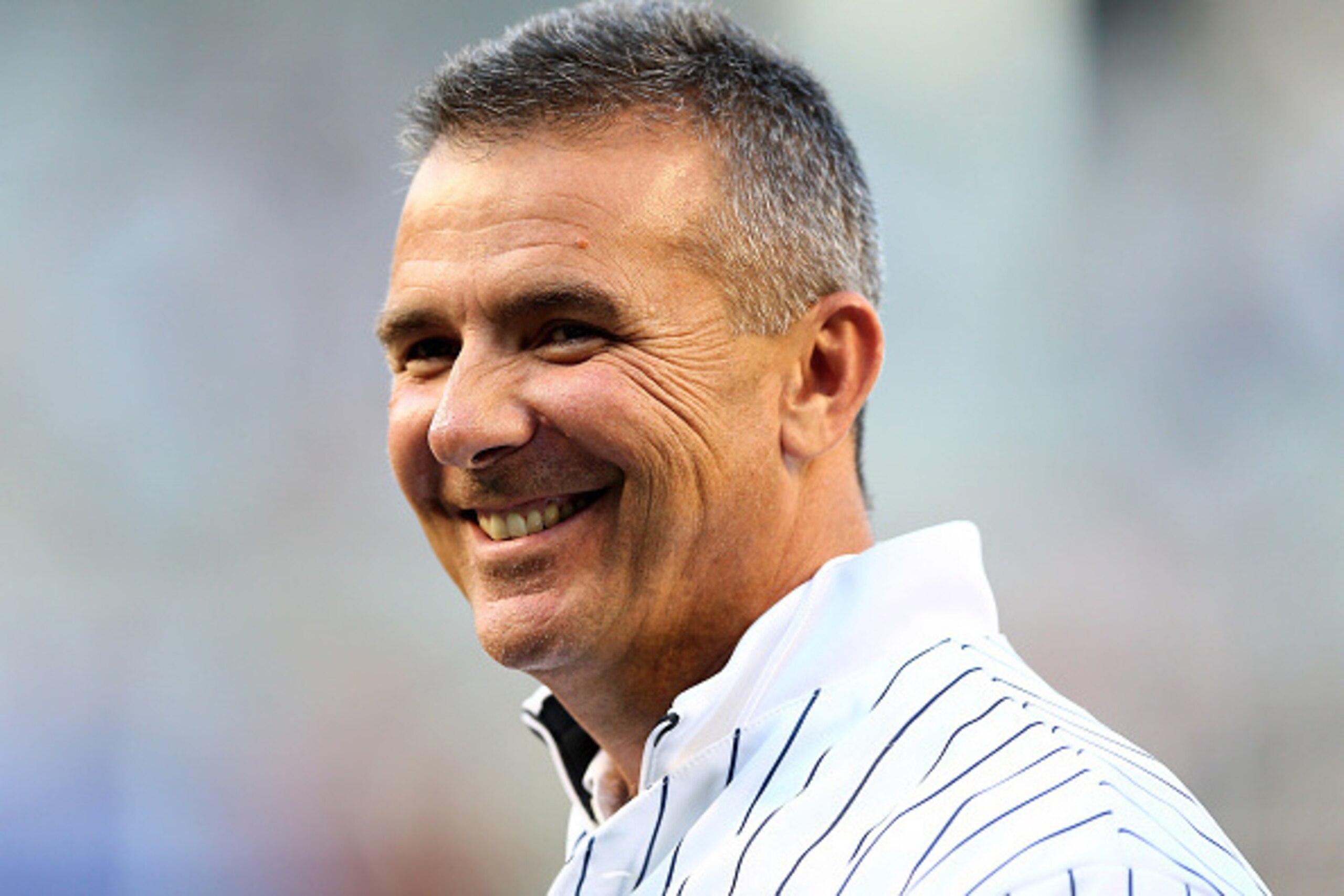 NEW YORK, NY - MAY 08: Ohio State football coach Urban Meyer stands on the field before he threw out ceremonial first pitch before the game between the New York Yankees and the Baltimore Orioles on May 8, 2015 at Yankee Stadium in the Bronx borough of Ne NEW YORK, NY - MAY 08: Ohio State football coach Urban Meyer stands on the field before he threw out ceremonial first pitch before the game between the New York Yankees and the Baltimore Orioles on May 8, 2015 at Yankee Stadium in the Bronx borough of Ne