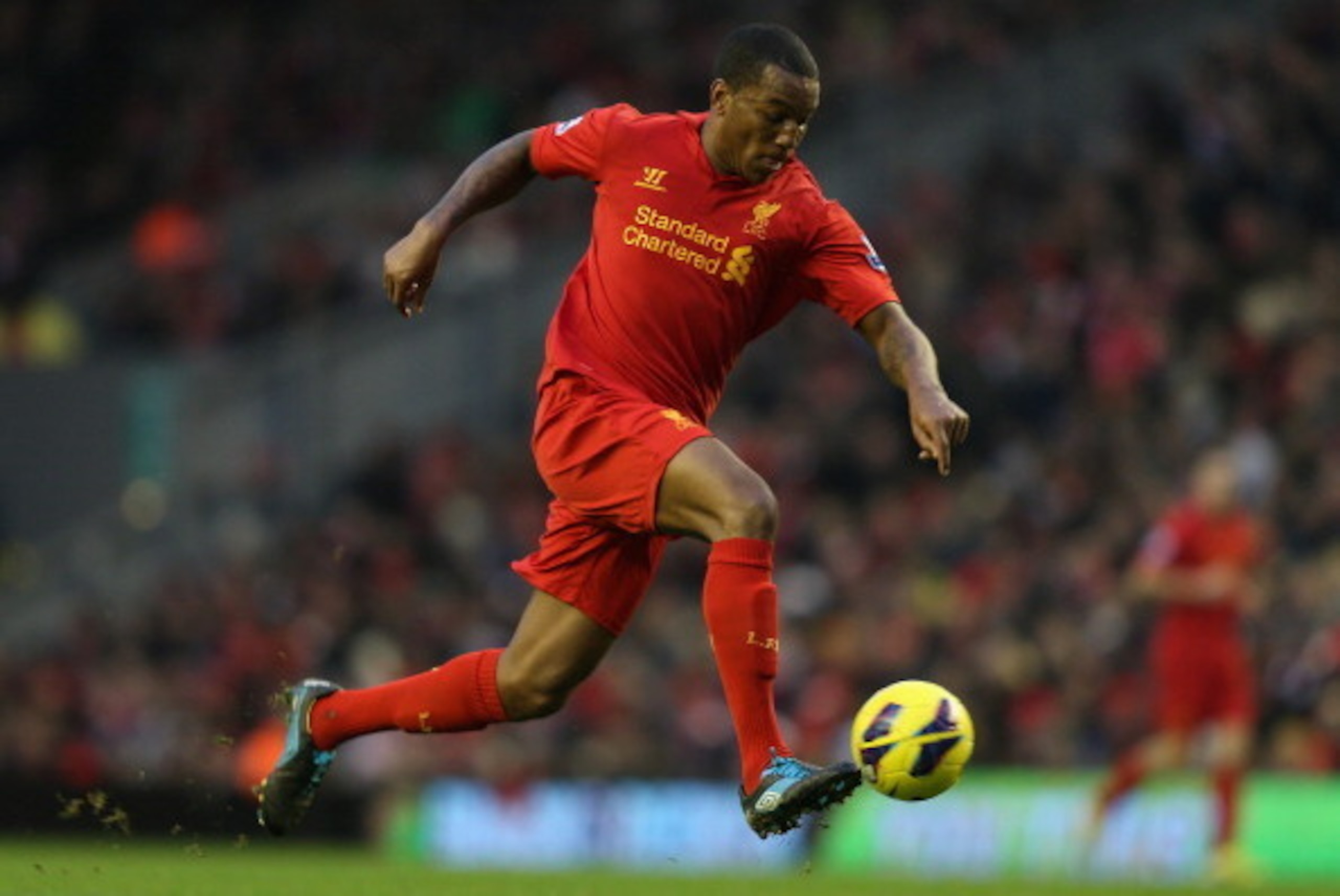 LIVERPOOL, ENGLAND - JANUARY 19:   Andre Wisdom of Liverpool in action during the Barclays Premier League match between Liverpool and Norwich City at Anfield on January 19, 2013 in Liverpool, England.  (Photo by Mark Thompson/Getty Images)
