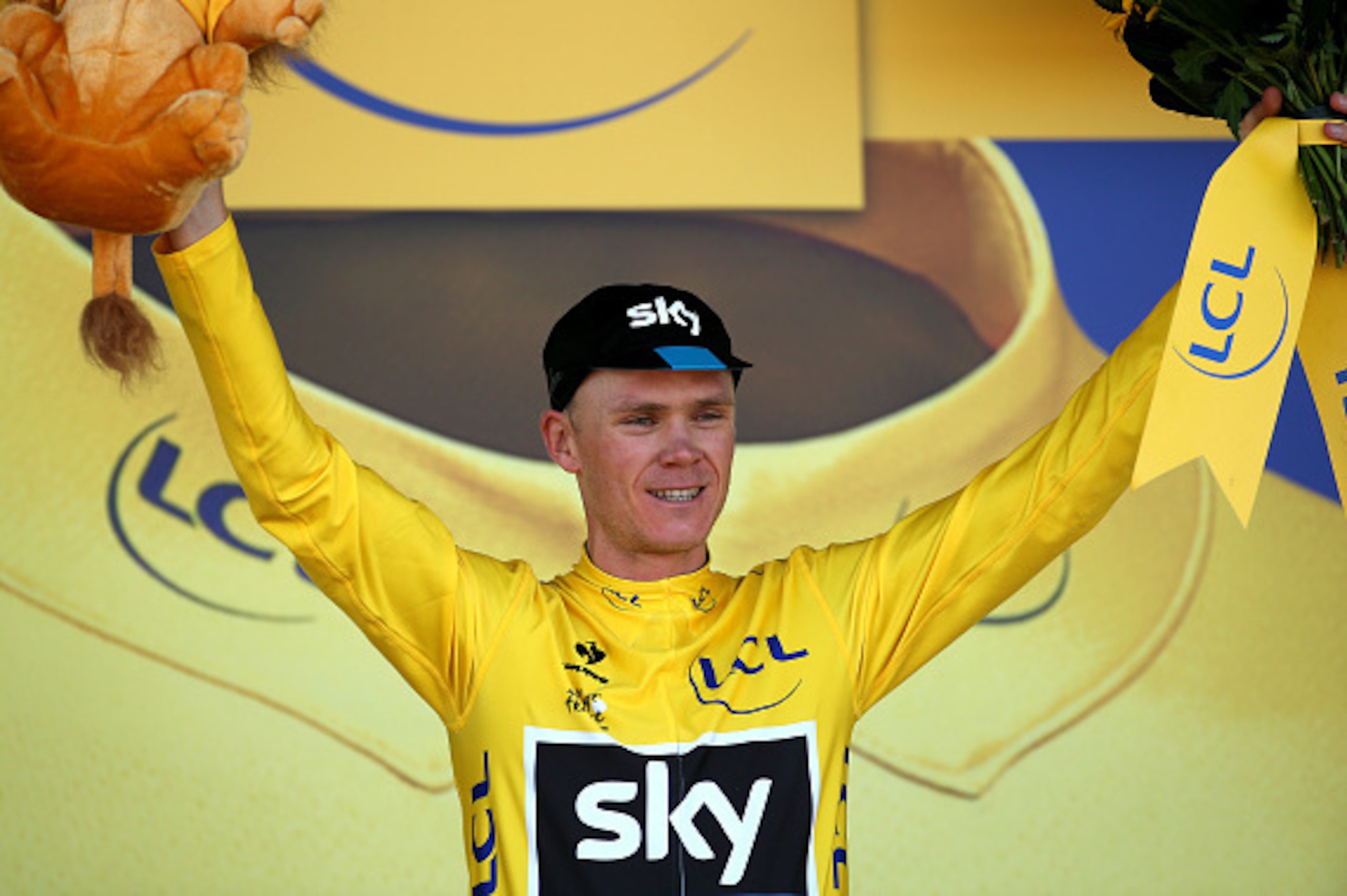 MUR DE BRETAGNE, FRANCE - JULY 11: Chris Froome of Great Britain and Team Sky celebrates as he retains the yellow jersey following stage eight of the 2015 Tour de France, a 181.5km stage between Rennes and Mur de Bretagne on July 11, 2015 in Mur de Breta MUR DE BRETAGNE, FRANCE - JULY 11: Chris Froome of Great Britain and Team Sky celebrates as he retains the yellow jersey following stage eight of the 2015 Tour de France, a 181.5km stage between Rennes and Mur de Bretagne on July 11, 2015 in Mur de Breta