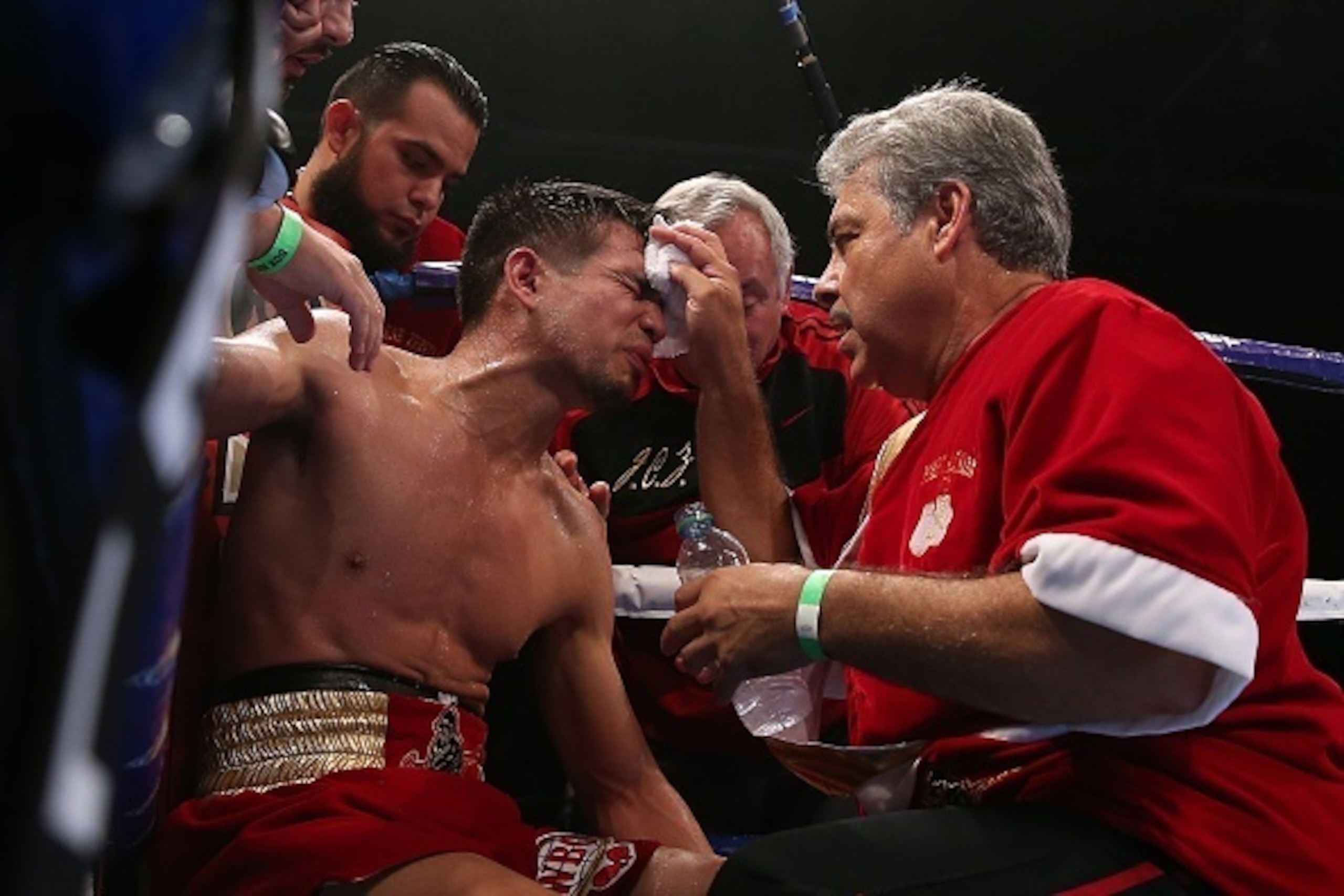 MANCHESTER, ENGLAND - JULY 11: Jose Zepeda receives treatment for an injured shoulder during his WBO Lightweight Championship fight with Terry Flanagan at the Manchester Velodrome on July 11, 2015 in Manchester, England. (Photo by Chris Brunskill/Getty Im
