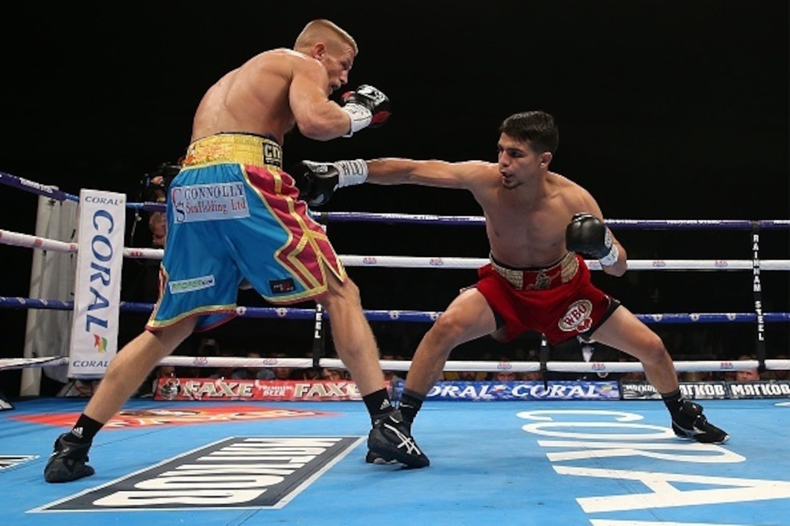 MANCHESTER, ENGLAND - JULY 11: Terry Flanagan (L) exchanges blows with Jose Zepeda during their WBO Lightweight Championship fight at the Manchester Velodrome on July 11, 2015 in Manchester, England. (Photo by Chris Brunskill/Getty Images)