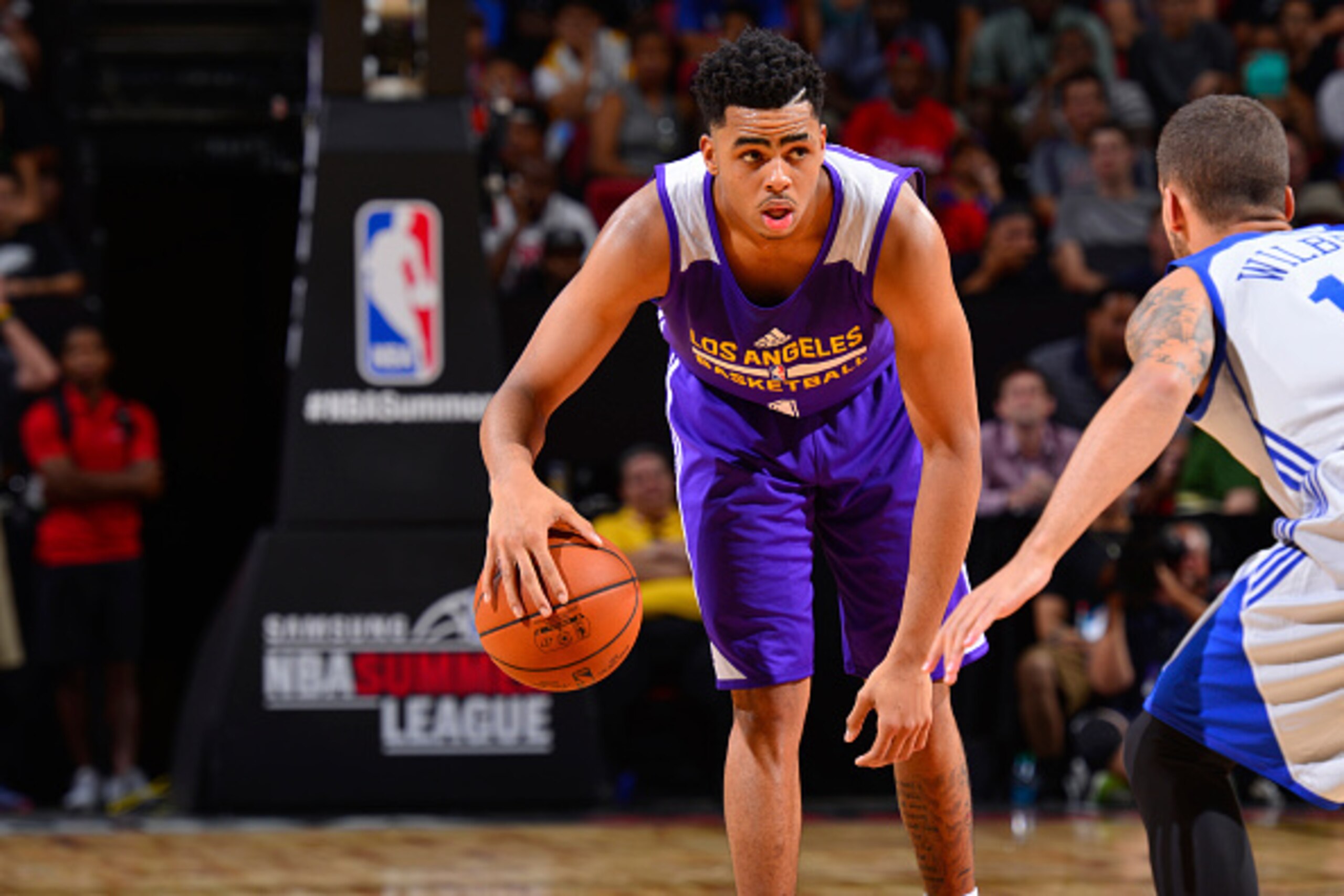 LAS VEGAS, NV - JULY 11: D'Angelo Russell #1 of the Los Angeles Lakers handles the ball against the Philadelphia 76ers on July 11, 2015 at Cox Pavilion in Las Vegas, Nevada. NOTE TO USER: User expressly acknowledges and agrees that, by downloading and or 