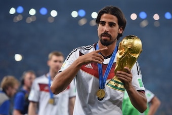 RIO DE JANEIRO, BRAZIL - JULY 13:  Sami Khedira of Germany celebrates with the World Cup trophy  after defeating Argentina 1-0 in extra time during the 2014 FIFA World Cup Brazil Final match between Germany and Argentina at Maracana on July 13, 2014 in Ri