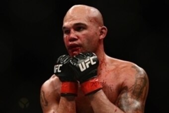 Jul 11, 2015; Las Vegas, NV, USA; Robbie Lawler (red gloves) and Rory MacDonald (blue gloves) fight during their welterweight title bout during UFC 189 at MGM Grand Garden Arena. Lawler won via fifth round TKO. Mandatory Credit: Joe Camporeale-USA TODAY S