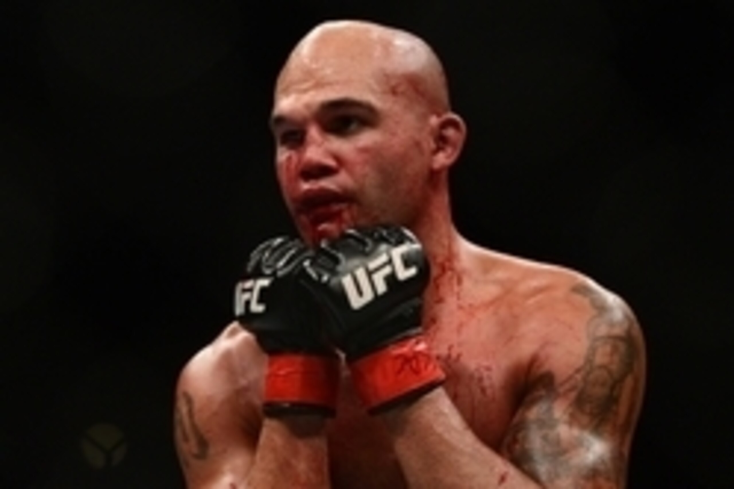 Jul 11, 2015; Las Vegas, NV, USA; Robbie Lawler (red gloves) and Rory MacDonald (blue gloves) fight during their welterweight title bout during UFC 189 at MGM Grand Garden Arena. Lawler won via fifth round TKO. Mandatory Credit: Joe Camporeale-USA TODAY S