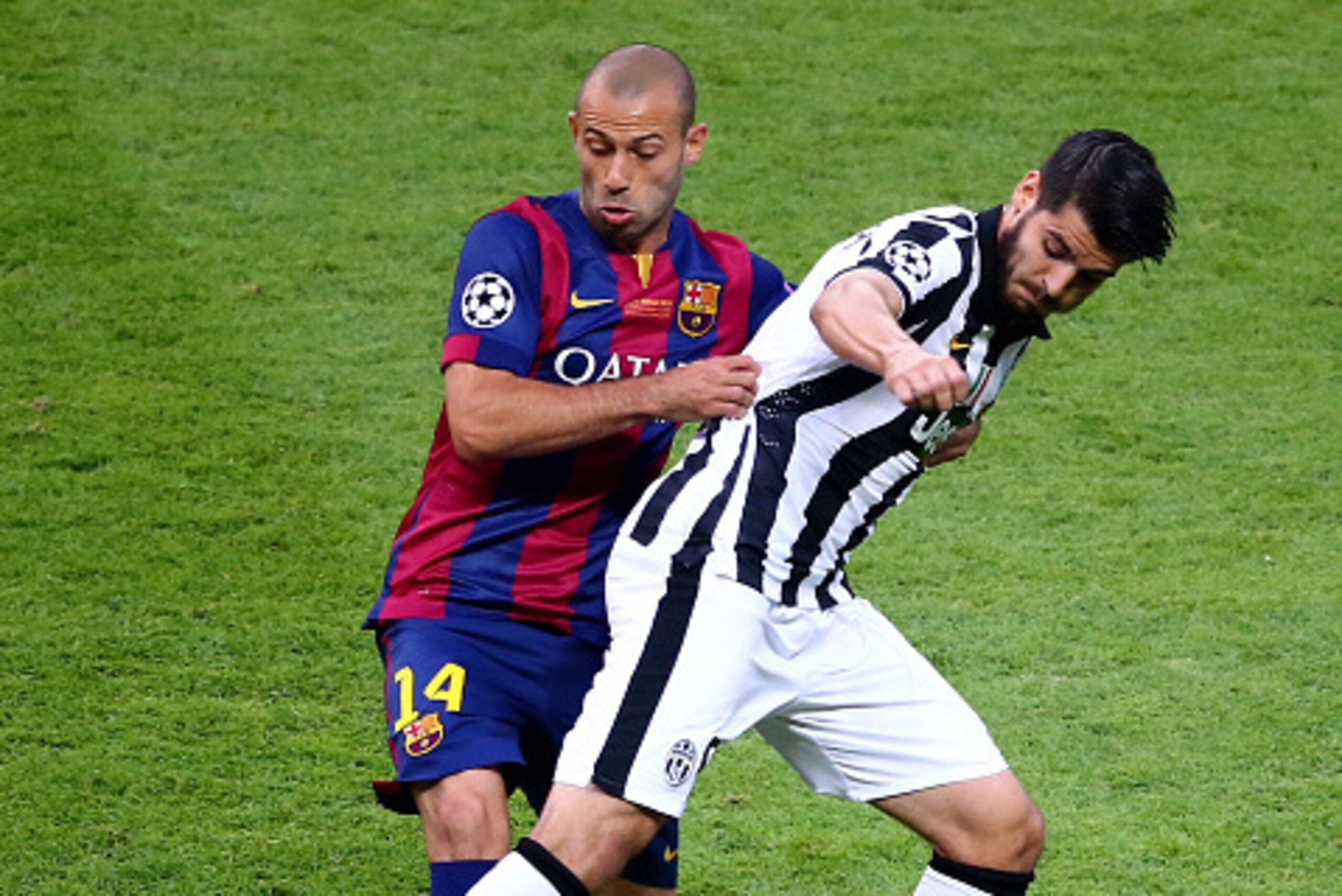 BERLIN, GERMANY - JUNE 06:  Javier Mascherano of Barcelona and Alvaro Morata of Juventus battle for the ball during the UEFA Champions League Final between Juventus and FC Barcelona at Olympiastadion on June 6, 2015 in Berlin, Germany.  (Photo by Martin R