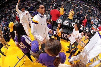 LOS ANGELES, CA - APRIL 12: Jordan Clarkson #6 of the Los Angeles Lakers gets introduced before a game against the Dallas Mavericks at STAPLES Center on April 12, 2015 in Los Angeles, California. NOTE TO USER: User expressly acknowledges and agrees that, 