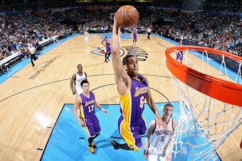 OKLAHOMA CITY, OK - MARCH 24:  Jordan Clarkson #6 of the Los Angeles Lakers goes up for a dunk against the Oklahoma City Thunder on March 24, 2015 at the Chesapeake Energy Arena in Oklahoma City, Oklahoma. NOTE TO USER: User expressly acknowledges and agr