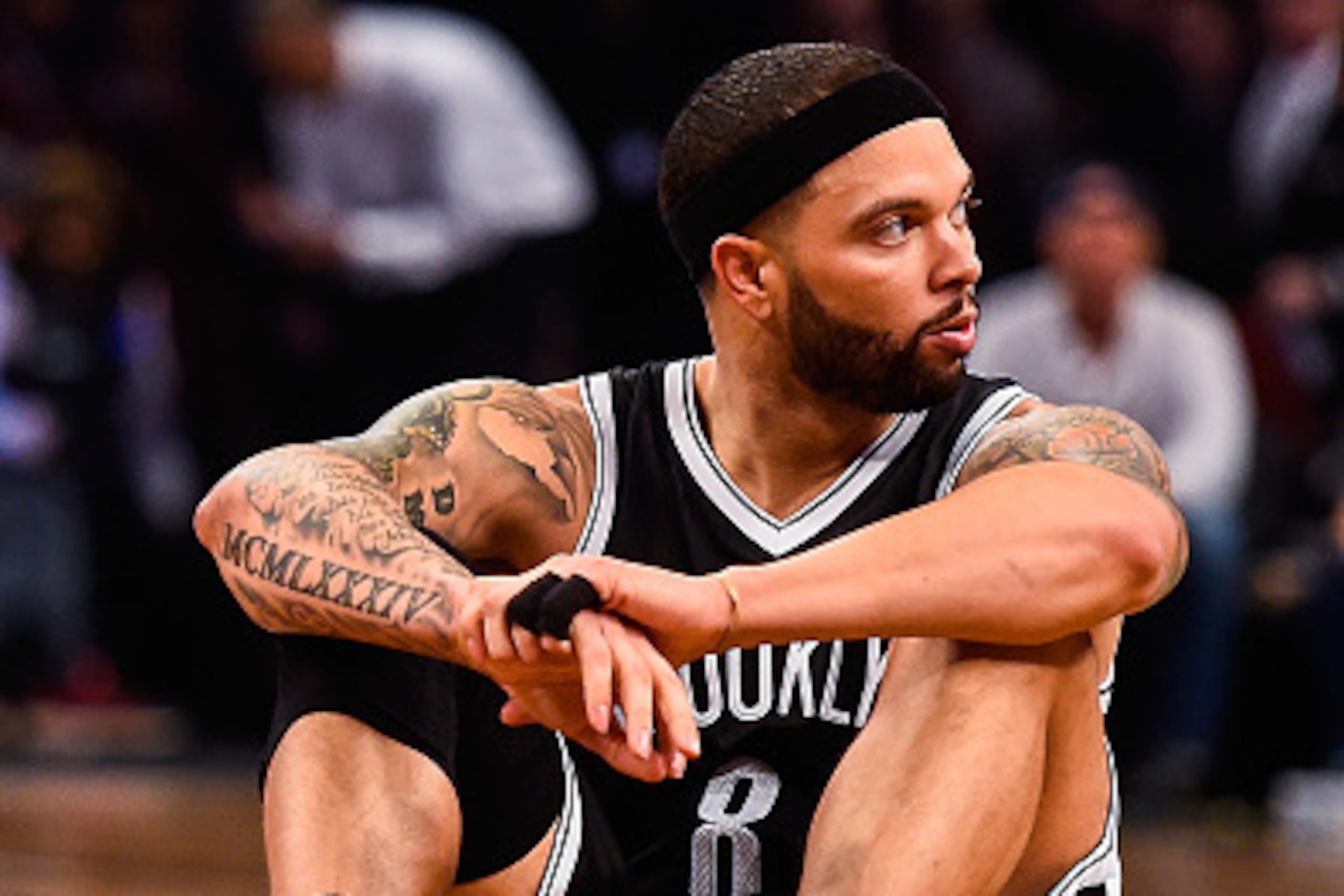 NEW YORK, NY - APRIL 25: Deron Williams #8 of the Brooklyn Nets looks on during the first round of the 2015 NBA Playoffs against the Atlanta Hawks at Barclays Center on April 25, 2015 in the Brooklyn borough of New York City. NOTE TO USER: User expressly 