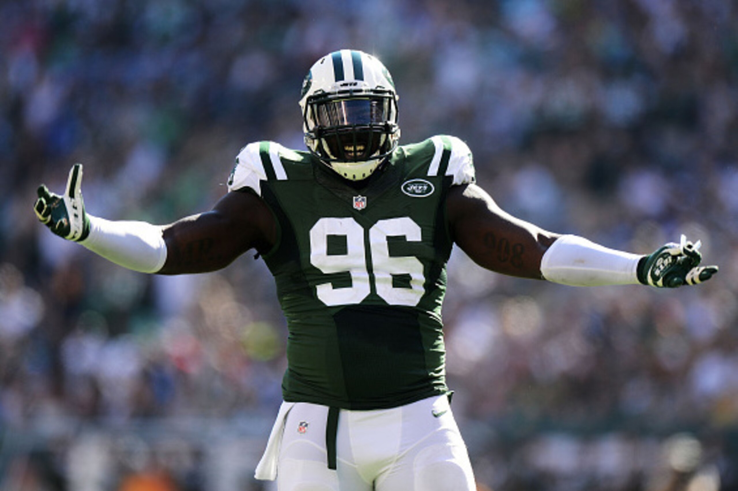 EAST RUTHERFORD, NJ - SEPTEMBER 28:   Muhammad Wilkerson #96 of the New York Jets reacts during their game against the Detroit Lions at MetLife Stadium on September 28, 2014 in East Rutherford, New Jersey.  (Photo by Ron Antonelli/Getty Images)