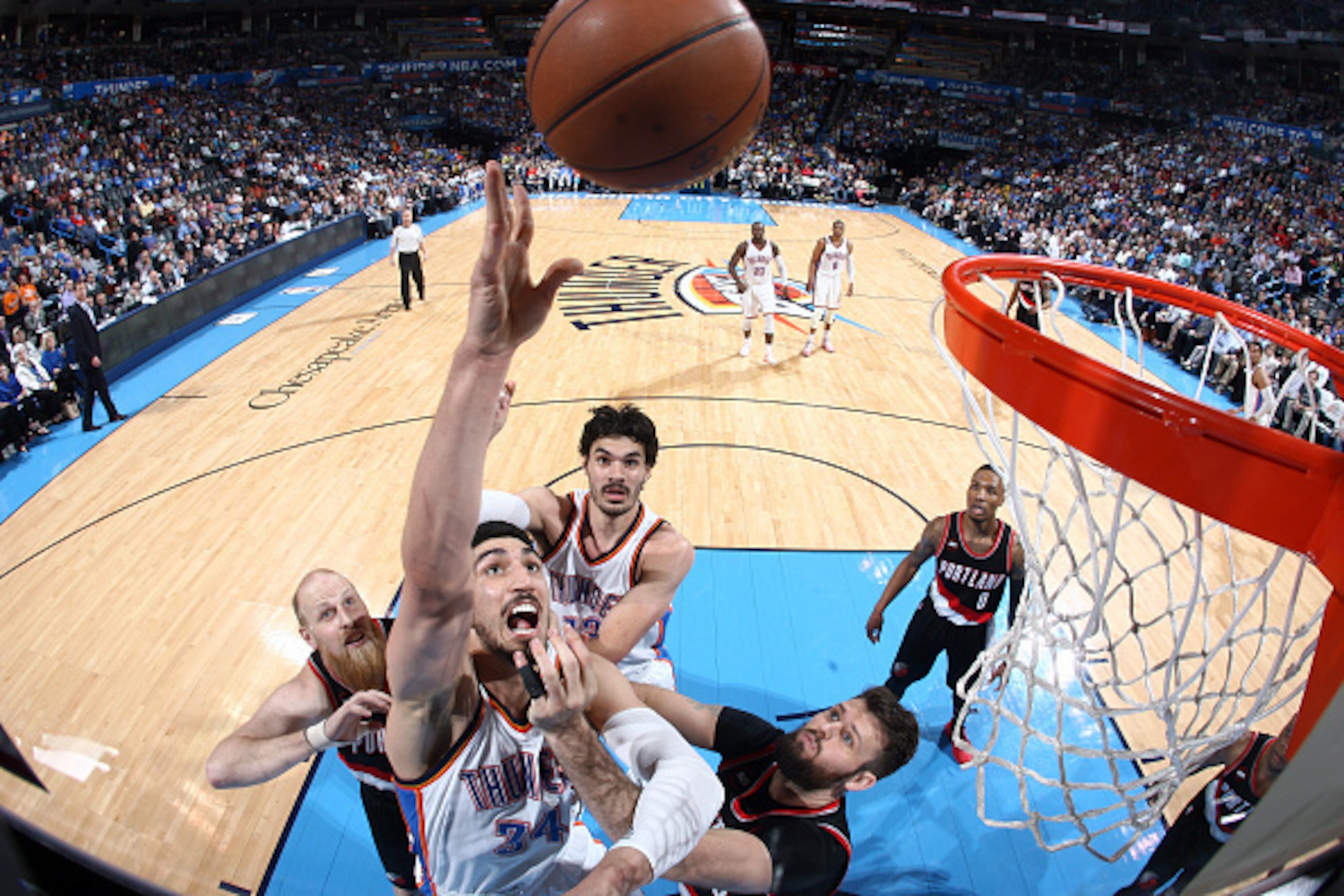 OKLAHOMA CITY, OK- APRIL 13: Enes Kanter #34 of the Oklahoma City Thunder shoots against the Portland Trail Blazers on April 13, 2015 at Chesapeake Energy Arena in Oklahoma City, Oklahoma. NOTE TO USER: User expressly acknowledges and agrees that, by down