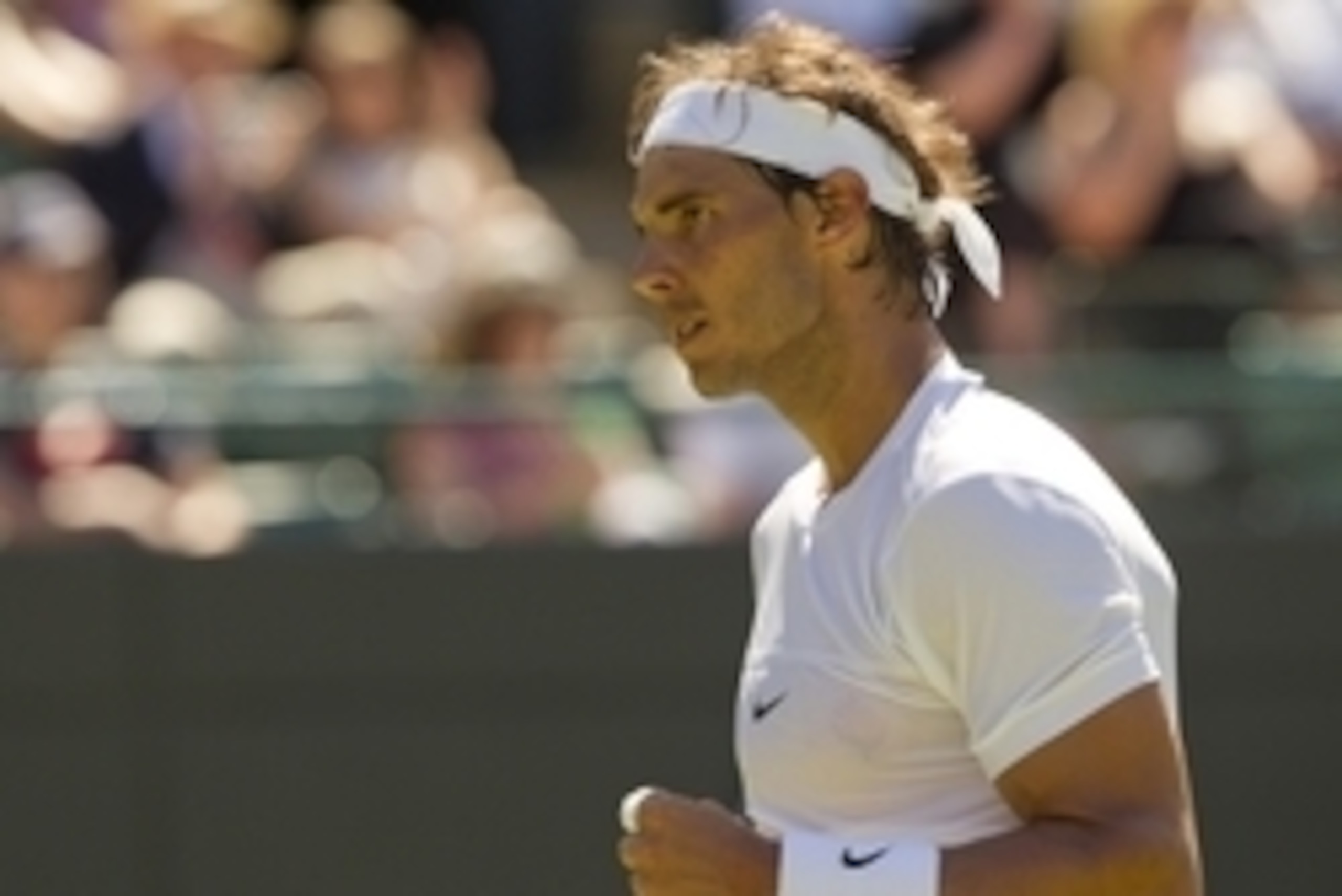 Jun 30, 2015; London, United Kingdom; Rafael Nadal (ESP) reacts during his match against Thomaz Bellucci (BRA) on day two of The Championships Wimbledon at the AELTC. Mandatory Credit: Susan Mullane-USA TODAY Sports