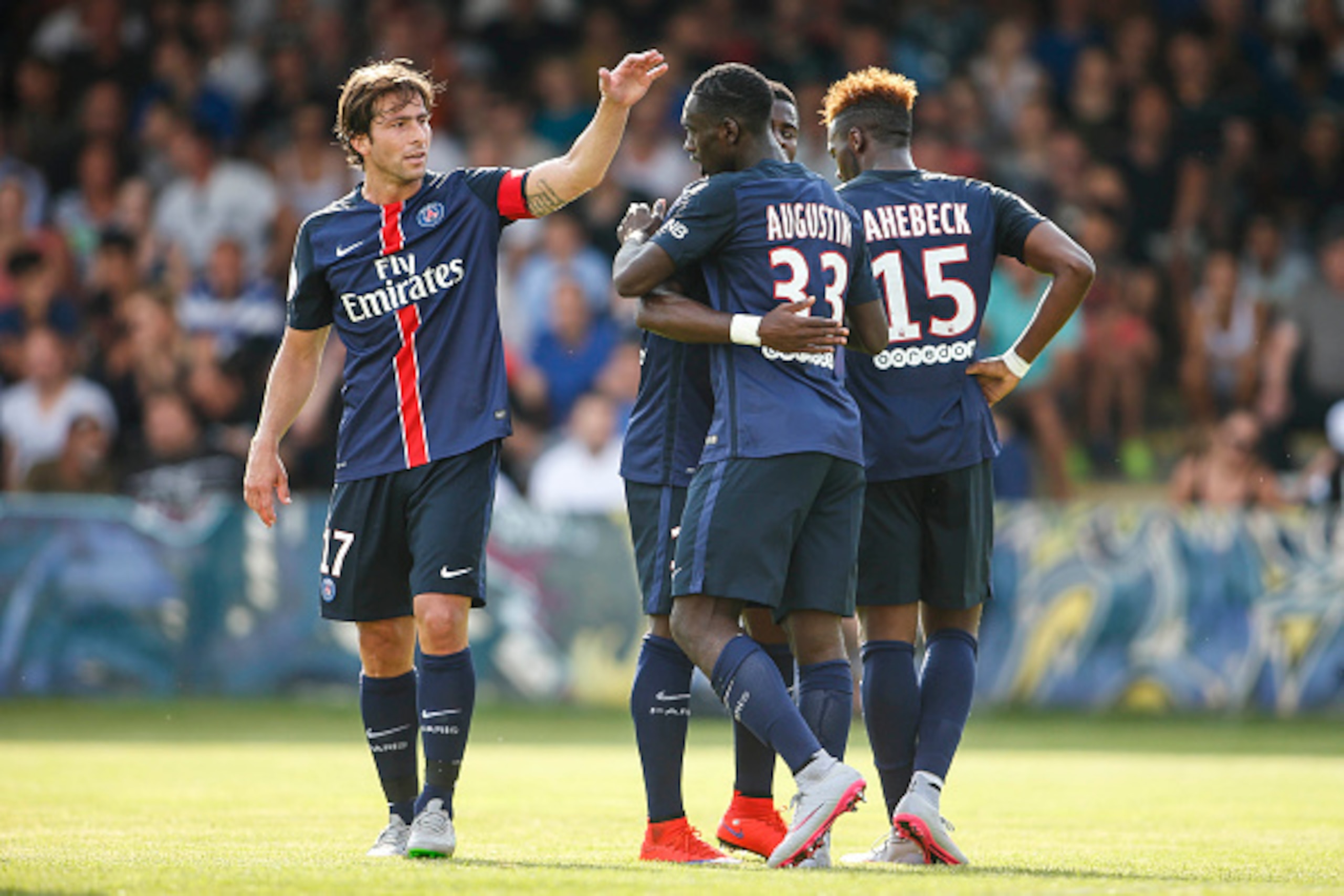 VIENNA, AUSTRIA - JULY 12:   (L-R) Maxwell Scherrer Cabelino Andrade, Jean-Kevin Augustin and Jean-Christophe Bahebeck of Paris Saint-Germain celebrate after scoring during the Friendly Match between Wiener Sportklub and Paris Saint-Germain at Sportclub P