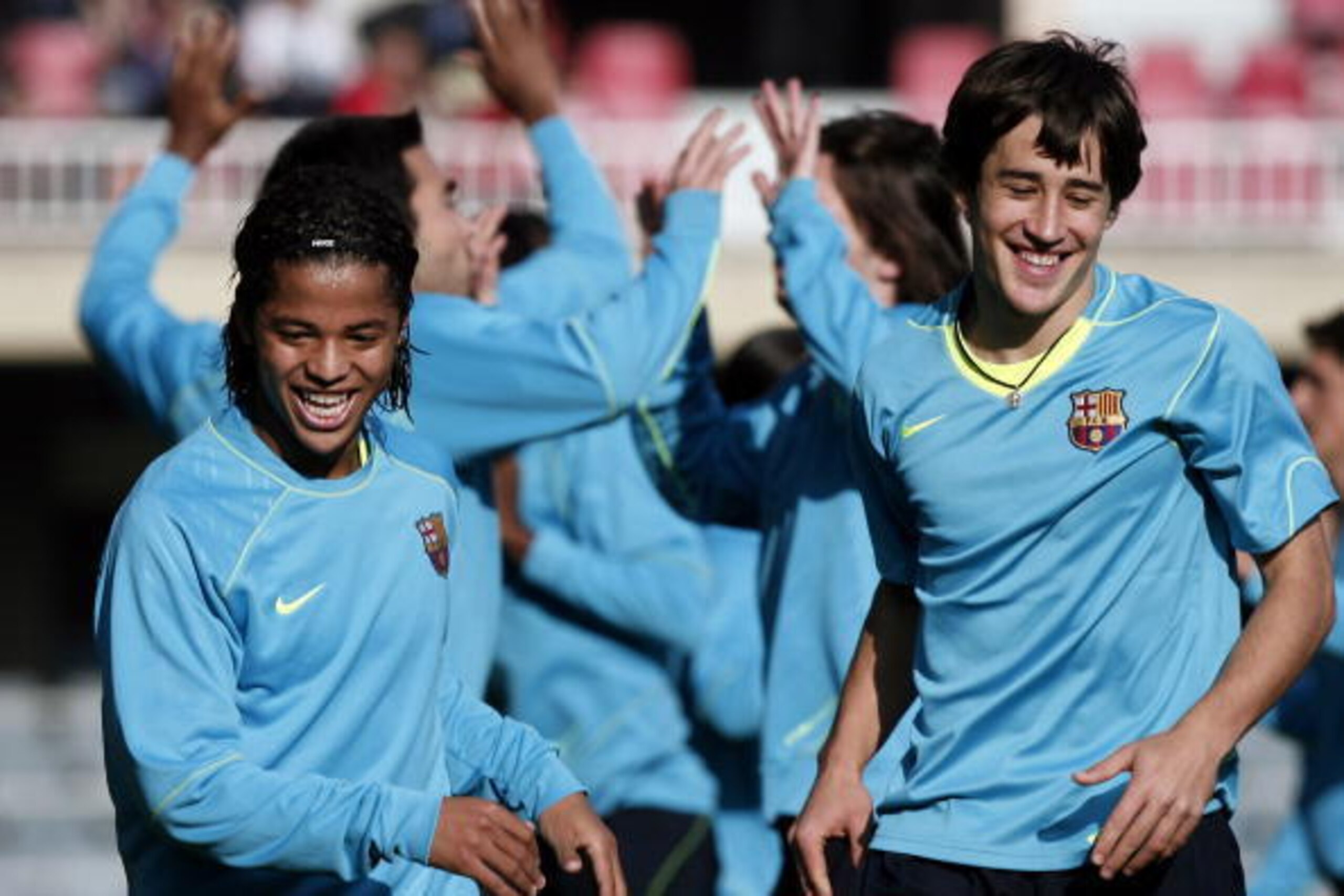 BARCELONA, SPAIN - DECEMBER 06:  Giovani Dos Santos (L) of Barcelona runs with his teammate Bojan Krkic during a training session at the Camp Nou Stadium on December 6, 2007 in Barcelona, Spain.  (Photo by Jasper Juinen/Getty Images)