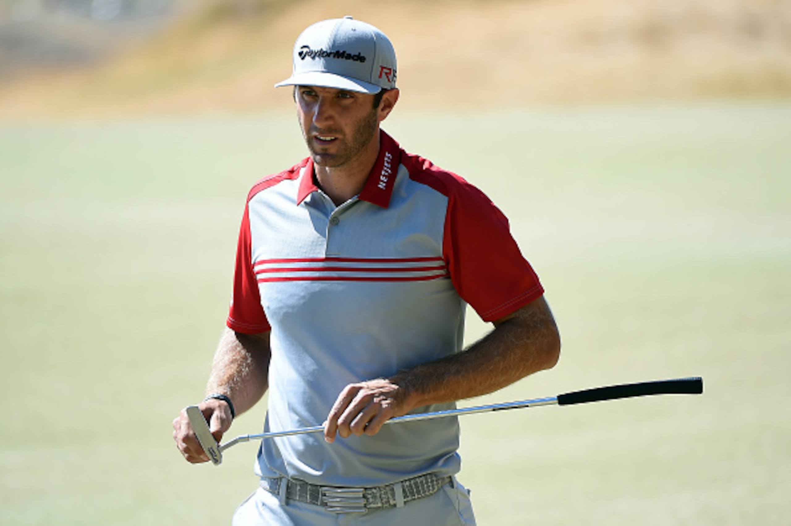 UNIVERSITY PLACE, WA - JUNE 20: Dustin Johnson of the United States saves par on the seventh hole during the third round of the 115th U.S. Open Championship at Chambers Bay on June 20, 2015 in University Place, Washington. (Photo by Harry How/Getty Image UNIVERSITY PLACE, WA - JUNE 20: Dustin Johnson of the United States saves par on the seventh hole during the third round of the 115th U.S. Open Championship at Chambers Bay on June 20, 2015 in University Place, Washington. (Photo by Harry How/Getty Image