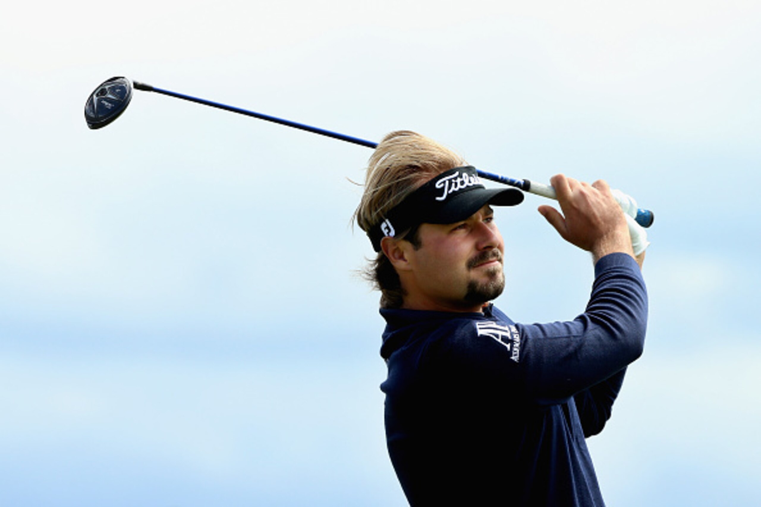 GULLANE, SCOTLAND - JULY 12:  Victor Dubuisson of France hits his tee shot on the first hole during the final round of the Aberdeen Asset Management Scottish Open at Gullane Golf Club on July 12, 2015 in Gullane, East Lothian, Scotland.  (Photo by Andrew 