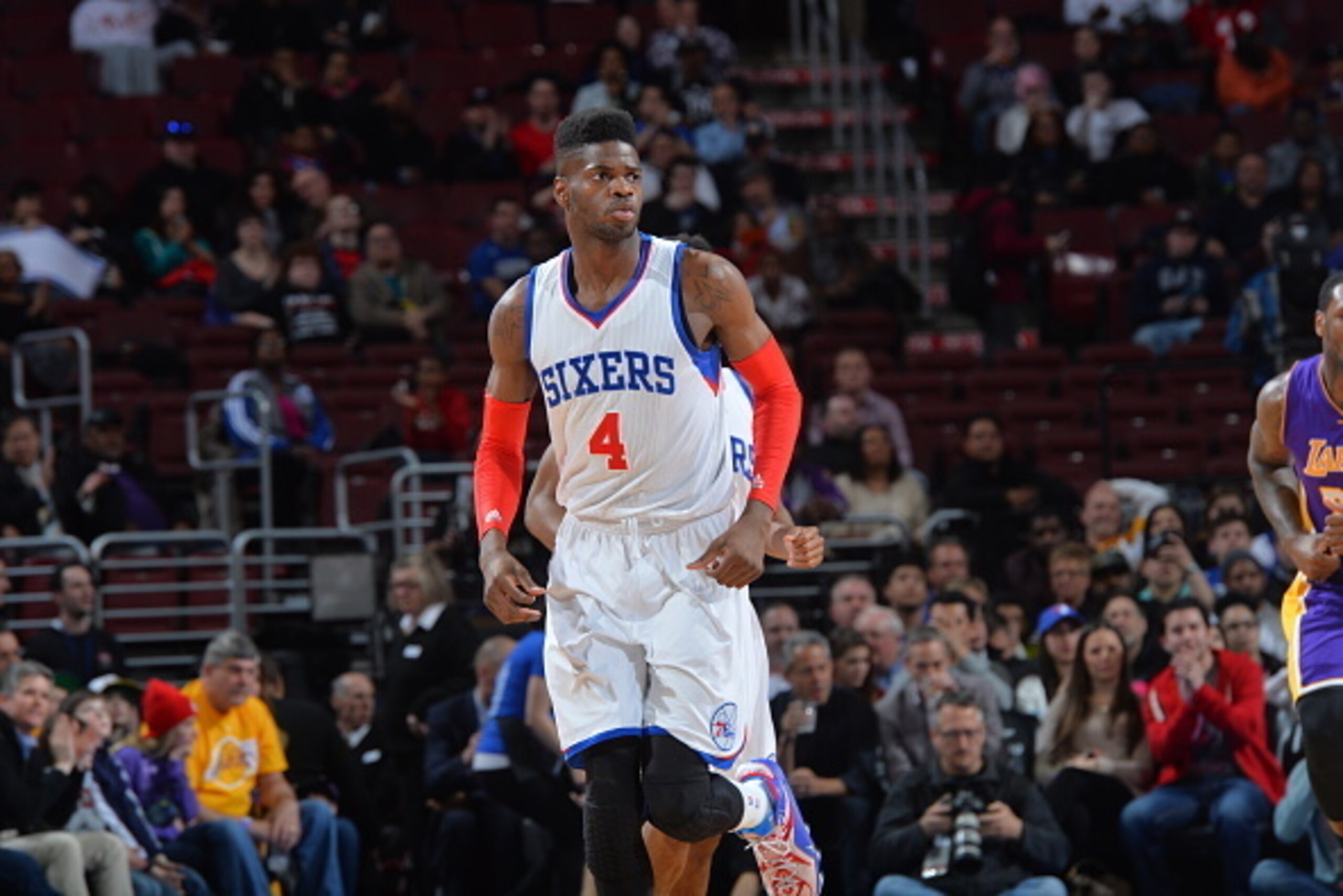 PHILADELPHIA,PA - MARCH 30: Nerlens Noel #4 of the Philadelphia 76ers runs up the court against the Los Angeles Lakers at Wells Fargo Center on March 30, 2015 in Philadelphia, Pennsylvania NOTE TO USER: User expressly acknowledges and agrees that, by down