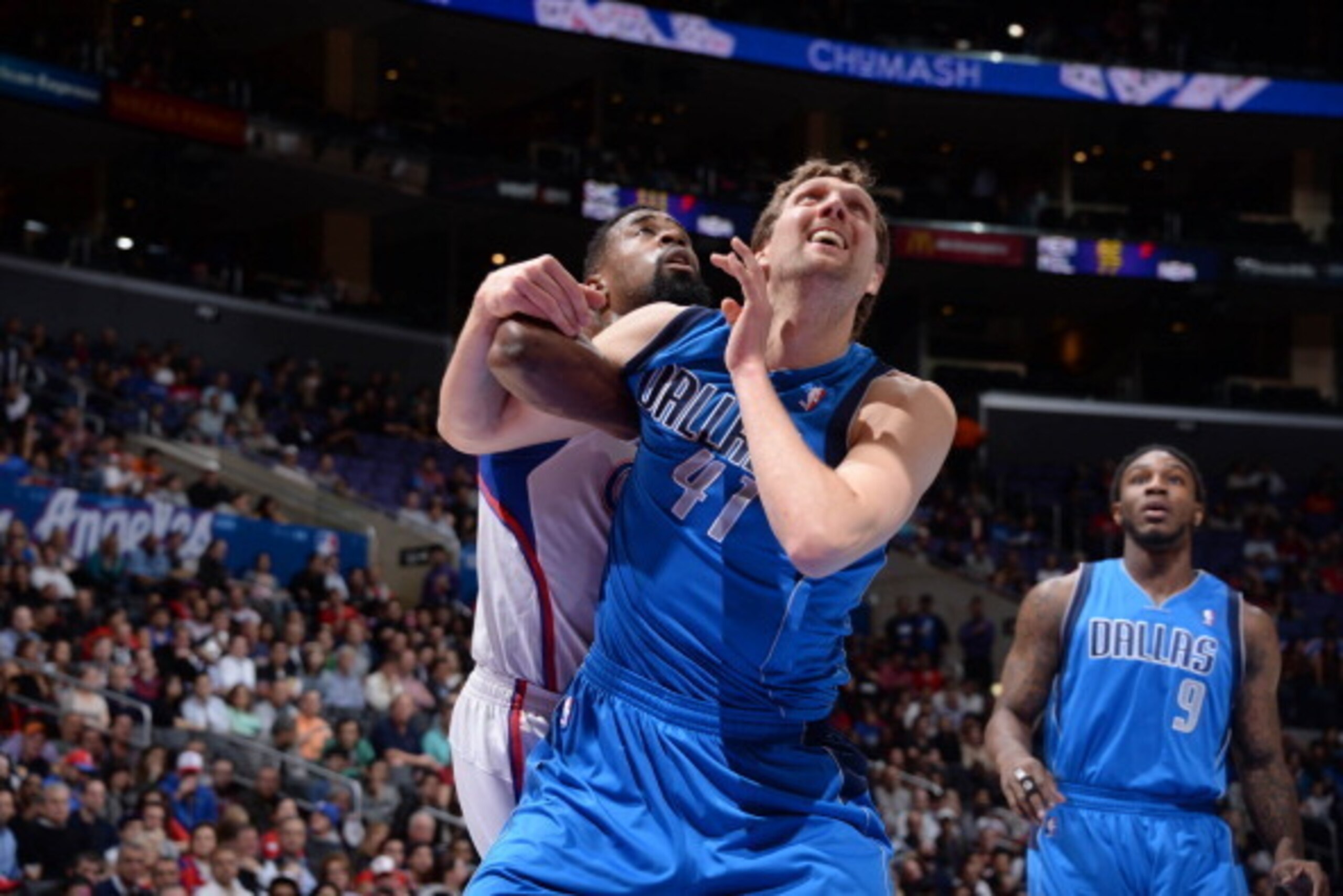LOS ANGELES, CA - JANUARY 15: DeAndre Jordan #6 of the Los Angeles Clippers and Dirk Nowitzki #41 of the Dallas Mavericks battle for positioning at Staples Center on January 15, 2014 in Los Angeles, California. NOTE TO USER: User expressly acknowledges an